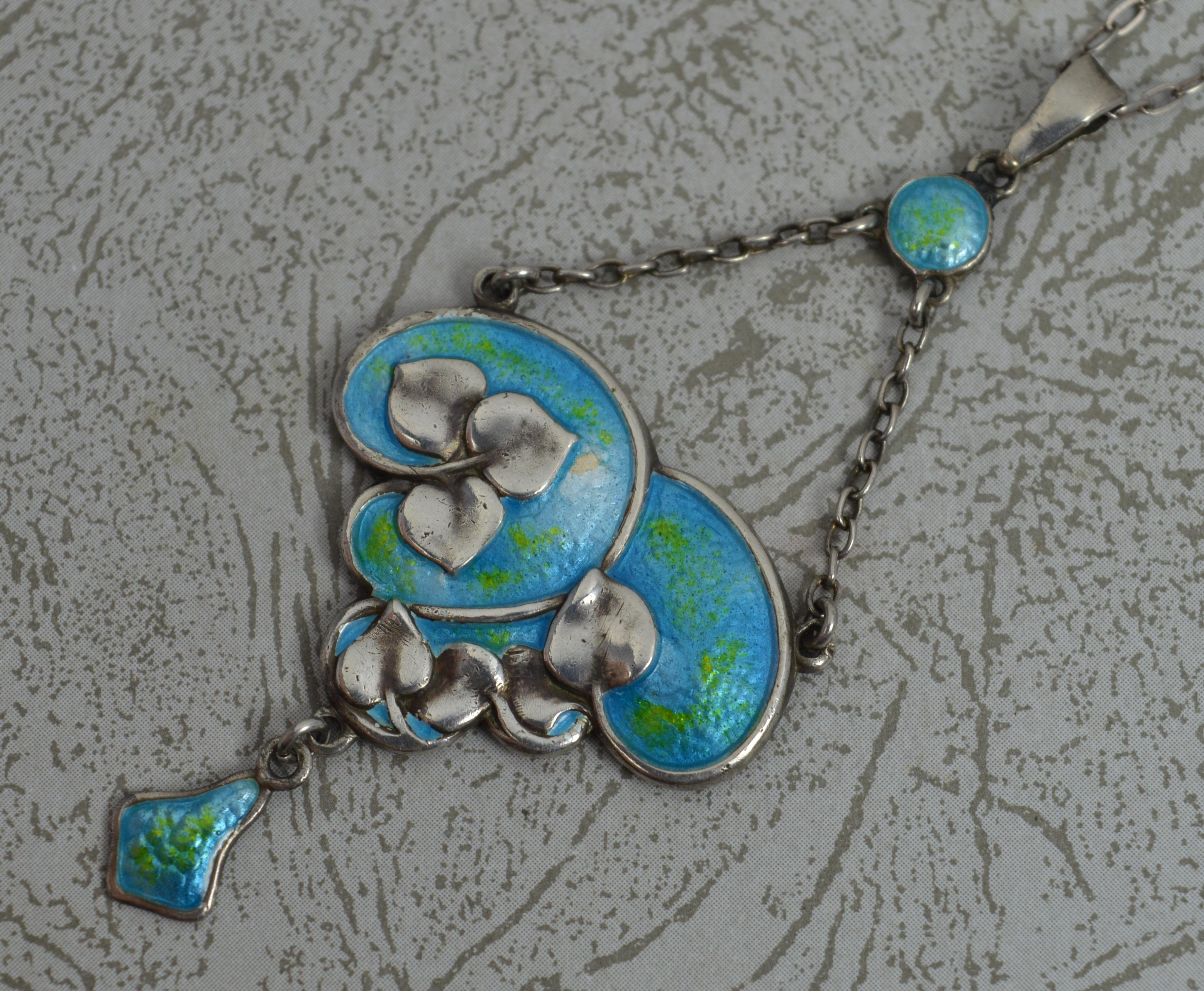 A stunning Chester silver brooch by Charles Horner.
Edwardian era, art nouveau in shape and design. Lavalier shape.
Sterling silver with vivid green and blue enamelling.

Hallmarks ; C.H Chester assay, date letter J, lion

Weight ; 8.3 grams
Size ;
