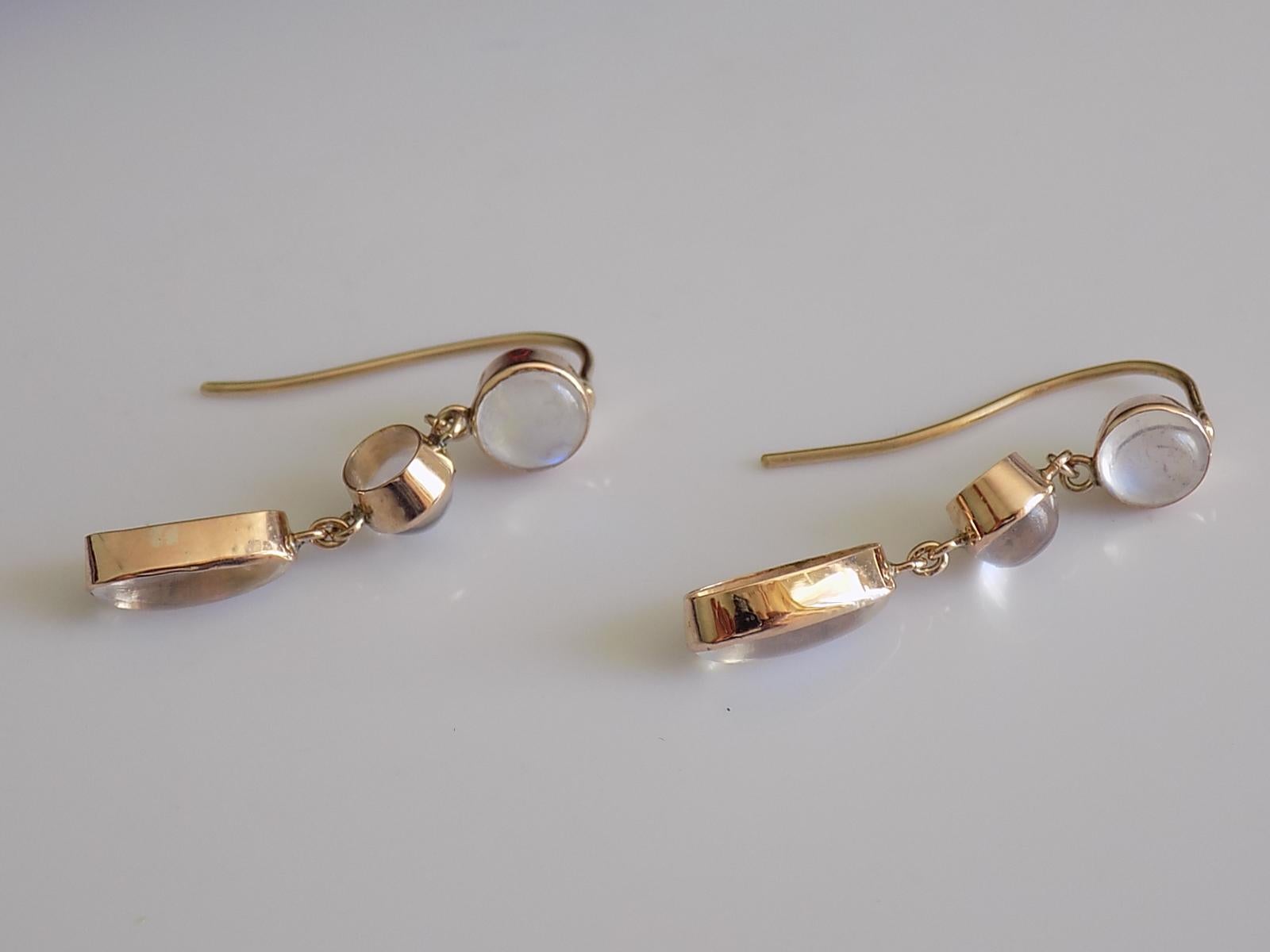 A Gorgeous Edwardian c.1900 9 Carat Gold and Moonstone drop earrings for pierced ears in antique box as found.

Drop 31mm.
Width of the top Moonstone 7mm.

The earrings in excellent condition for the age and ready to wear.