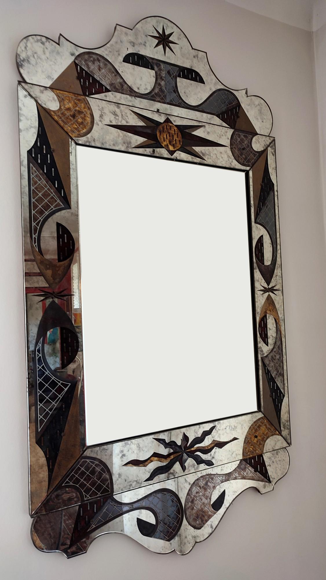 Stunning and rare eglomise mirror by French Artist Robert Pansart, around 1950.
The panels are in perfect condition except for 2 small chips on edges, visible on the photos (don't hesitate to contact me for more photos or explanations). 
 Robert