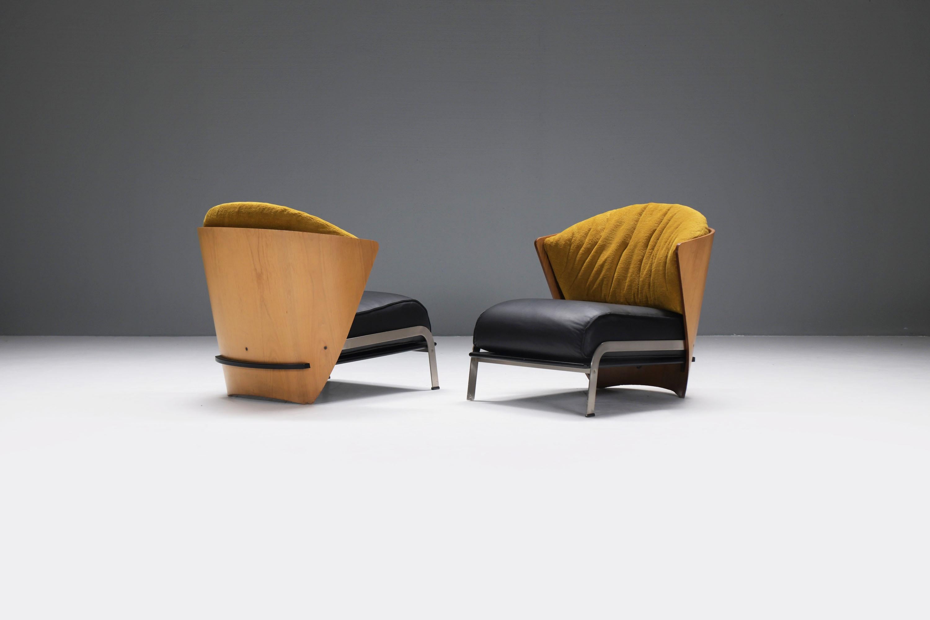 Wonderful, elegant pair of Elba chairs with new leather & fabric.
Designed by Franco Raggi for Cappellini Italy in 1983.

Designed in 1983 and produced in the 1980s through the late 1990's.  Beautiful elegant lines with leather seats and fabric