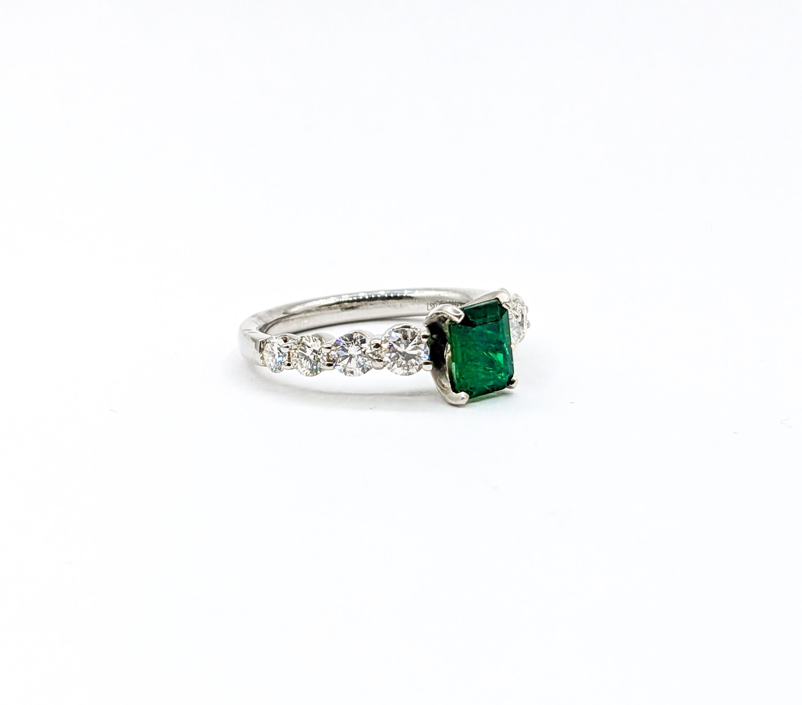 Contemporary Stunning Emerald and Graduated Diamond Ring in 14K White Gold For Sale