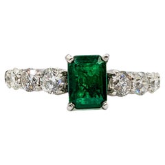 Stunning Emerald and Graduated Diamond Ring in 14K White Gold