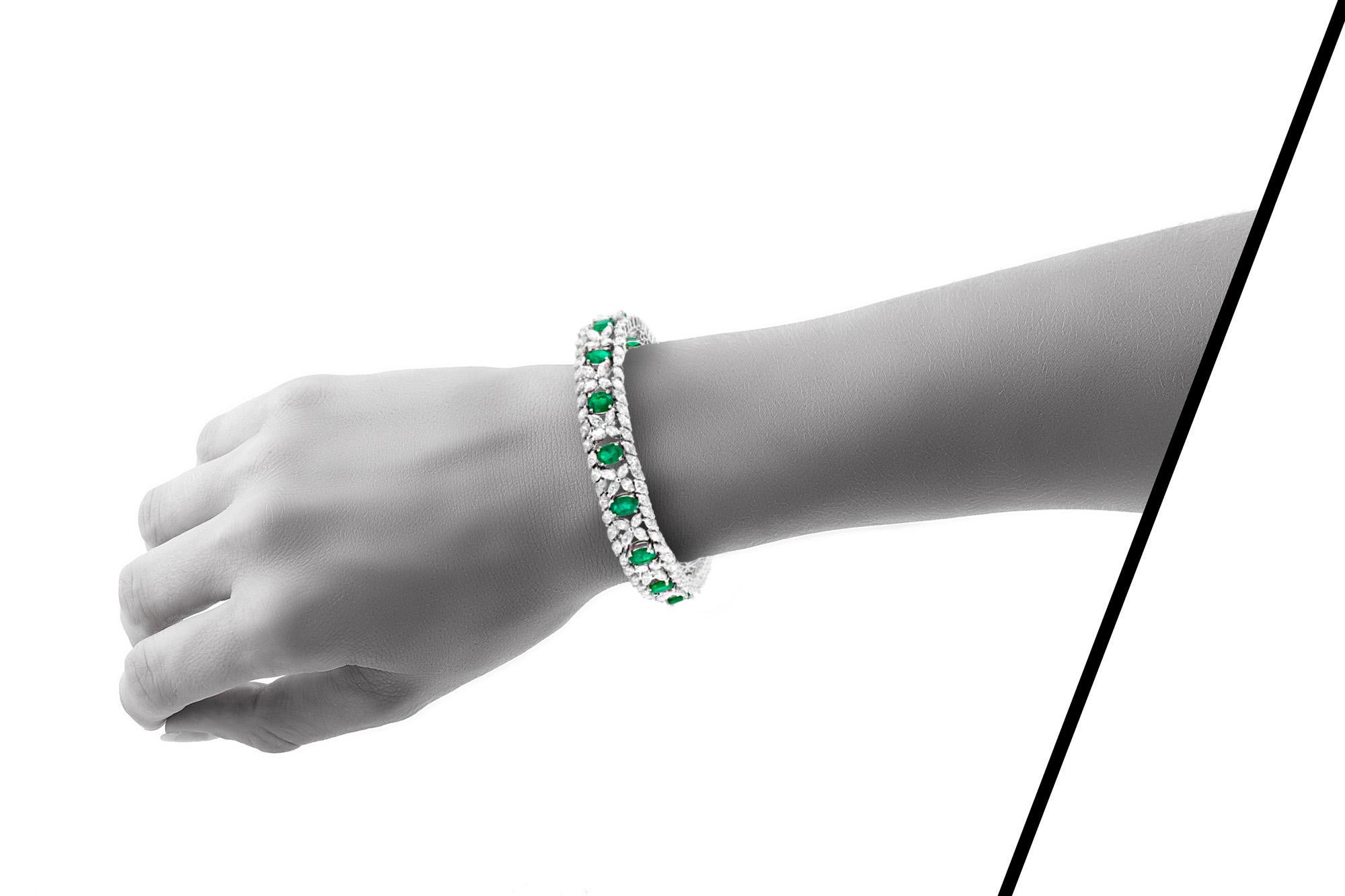 Bracelet, finely crafted in 18k white gold with diamonds weighing a total of 12.90 carat and emeralds weighing a total of 7.25 carat. Circa 2000's.