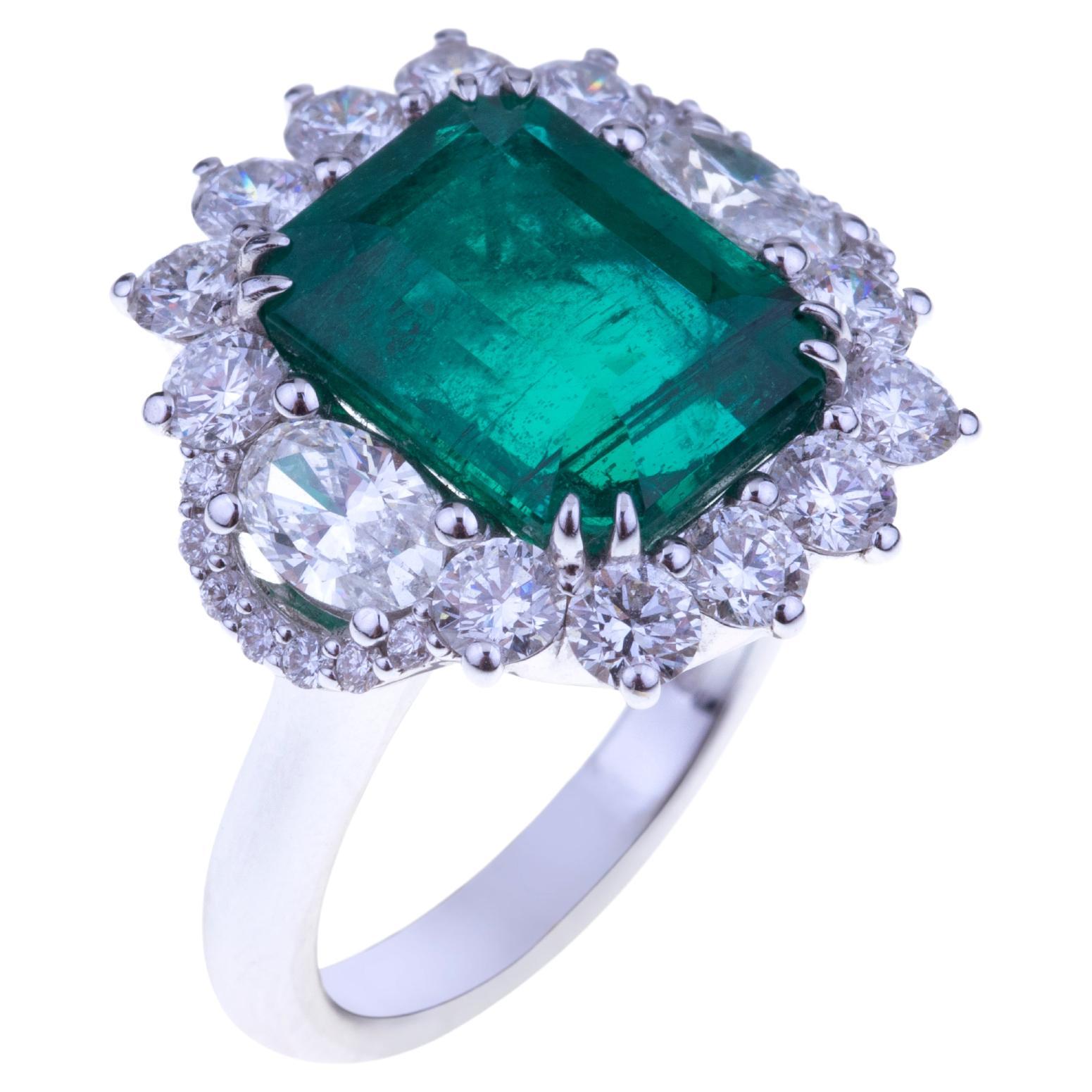 Stunning Emerald Ring Ct. 7.41 with Diamonds, Unique Stone with Certificate GRS For Sale