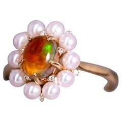 Superbe bague de fiançailles en or jaune 18 carats, opale de feu, perle et diamants
