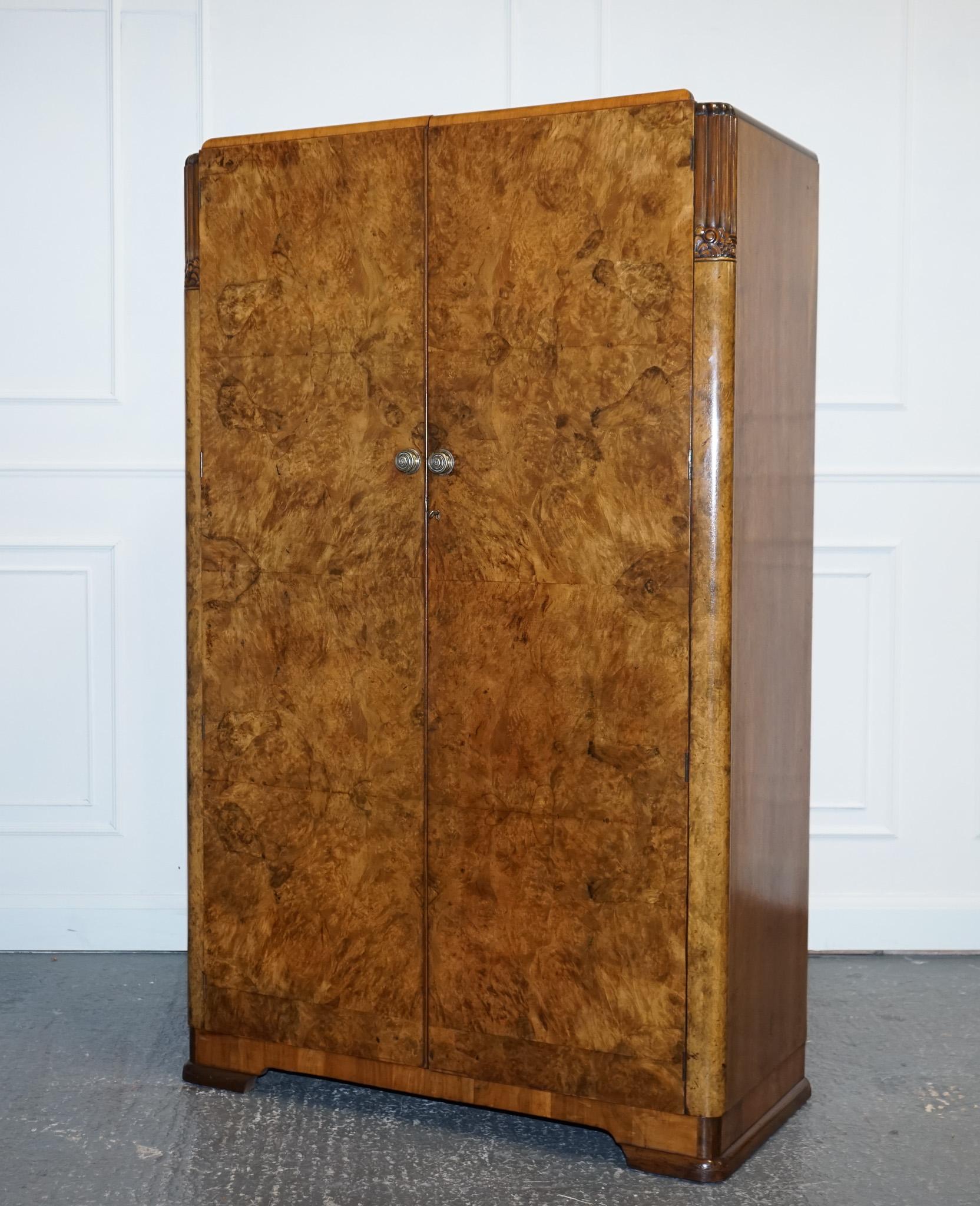 
We are delighted to offer for sale this English Art Deco 1930s Burr Walnut Wardrobe.

This stunning 1930s Art Deco double wardrobe is a true beauty.
 Its geometric lines and symmetry are reminiscent of the Art Deco style, while the rich burr