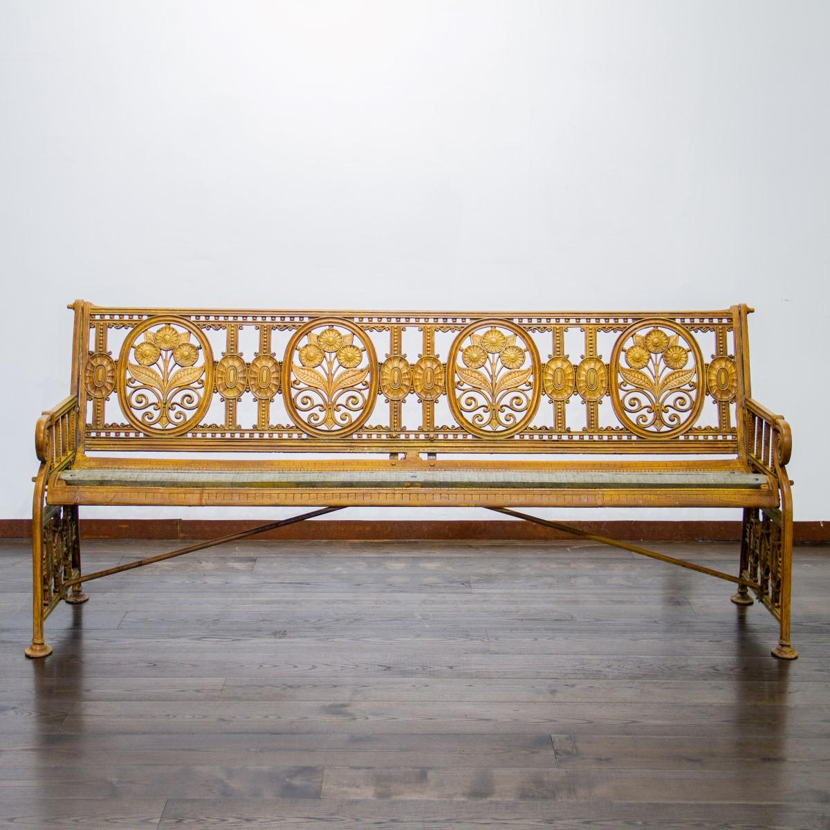 A stunning and rare English cast iron garden bench made by the Coalbrookdale Foundry, pattern no.71, designed by Christopher Dresser. This is a rare pattern (Reg No. 397749) and is stamped with the pattern, reg and Coalbrookdale patents office