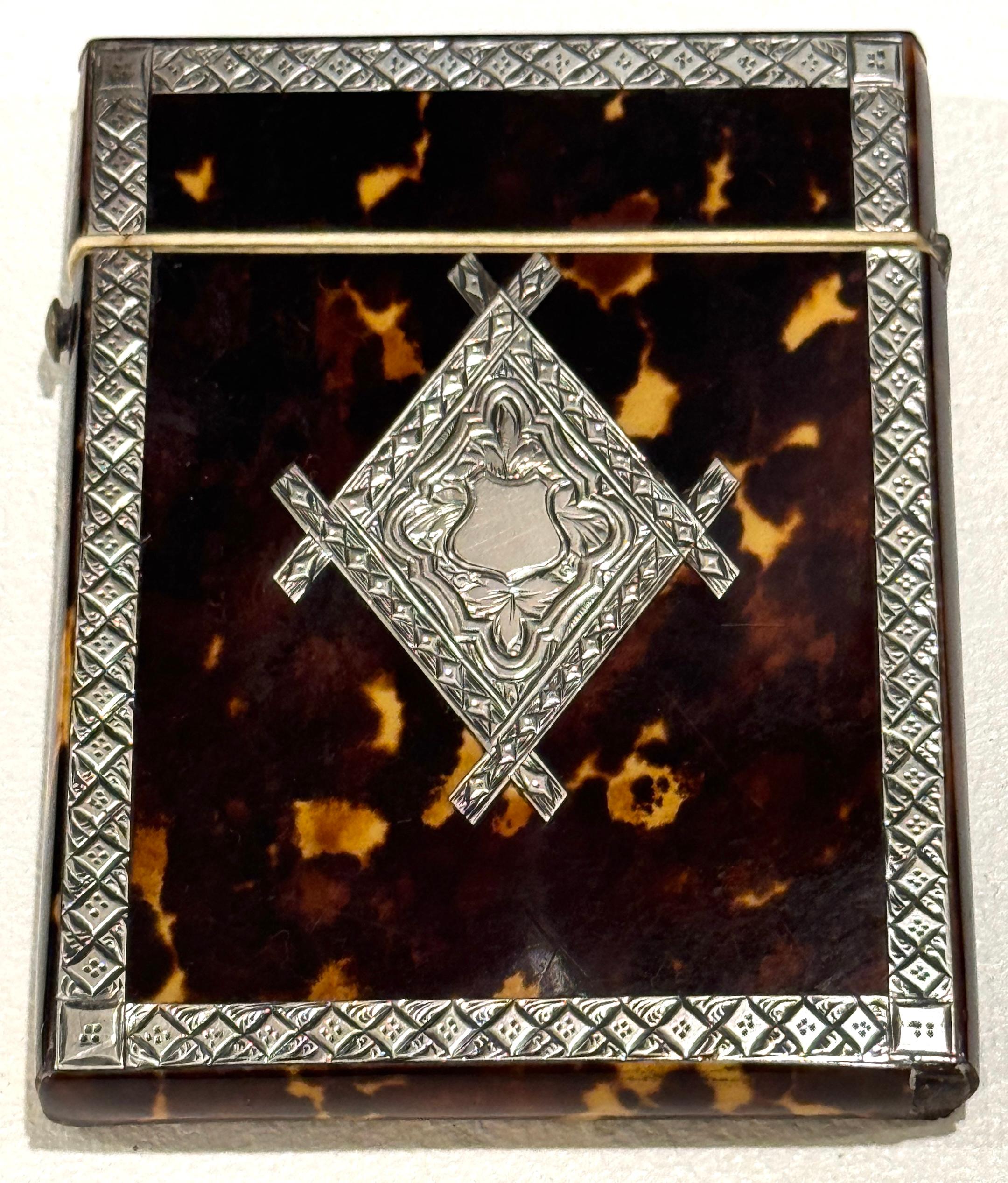Stunning English Regency Sterling Silver & Tortoiseshell Card Case, circa 1815

This exceptional English Regency card case, dating to the early 19th century (circa 1810–1825), exemplifies the refinement of personal accessories in the Georgian and
