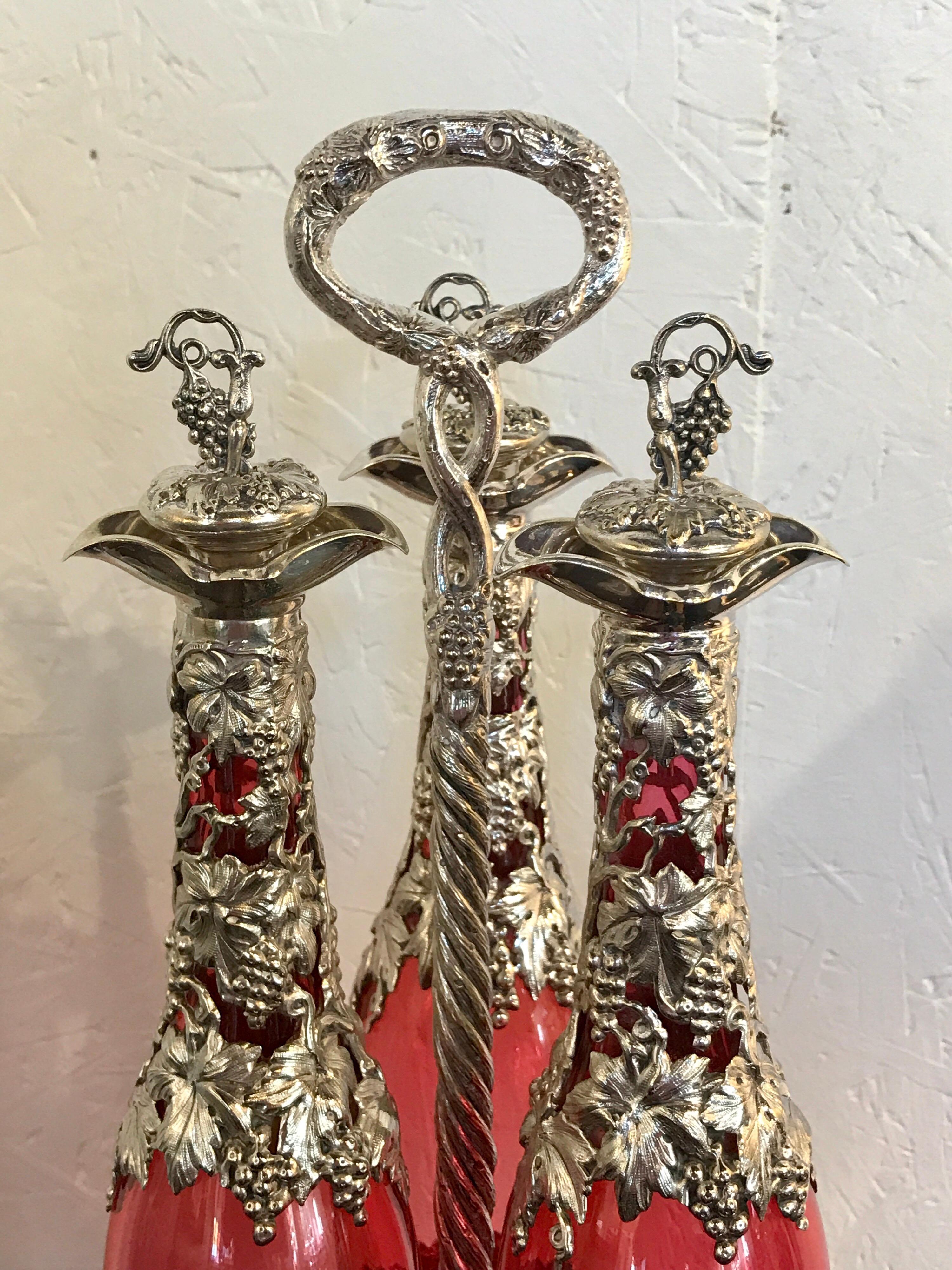 Stunning English Silver Plate and Cranberry Glass Three-Bottle Tauntless In Good Condition In West Palm Beach, FL
