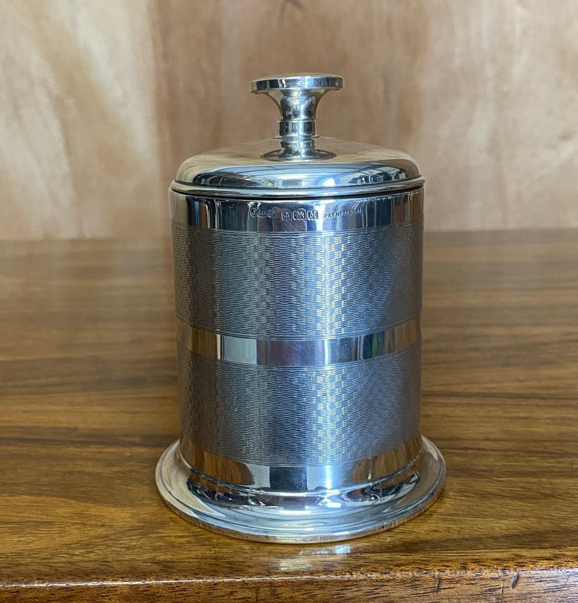 We are delighted to offer this lovely 1936 solid sterling silver art deco cigarette dispenser

A very good looking and well made piece, fully hallmarked with the sideways facing lion for Sterling Silver, the ships anchor for Birmingham, the date
