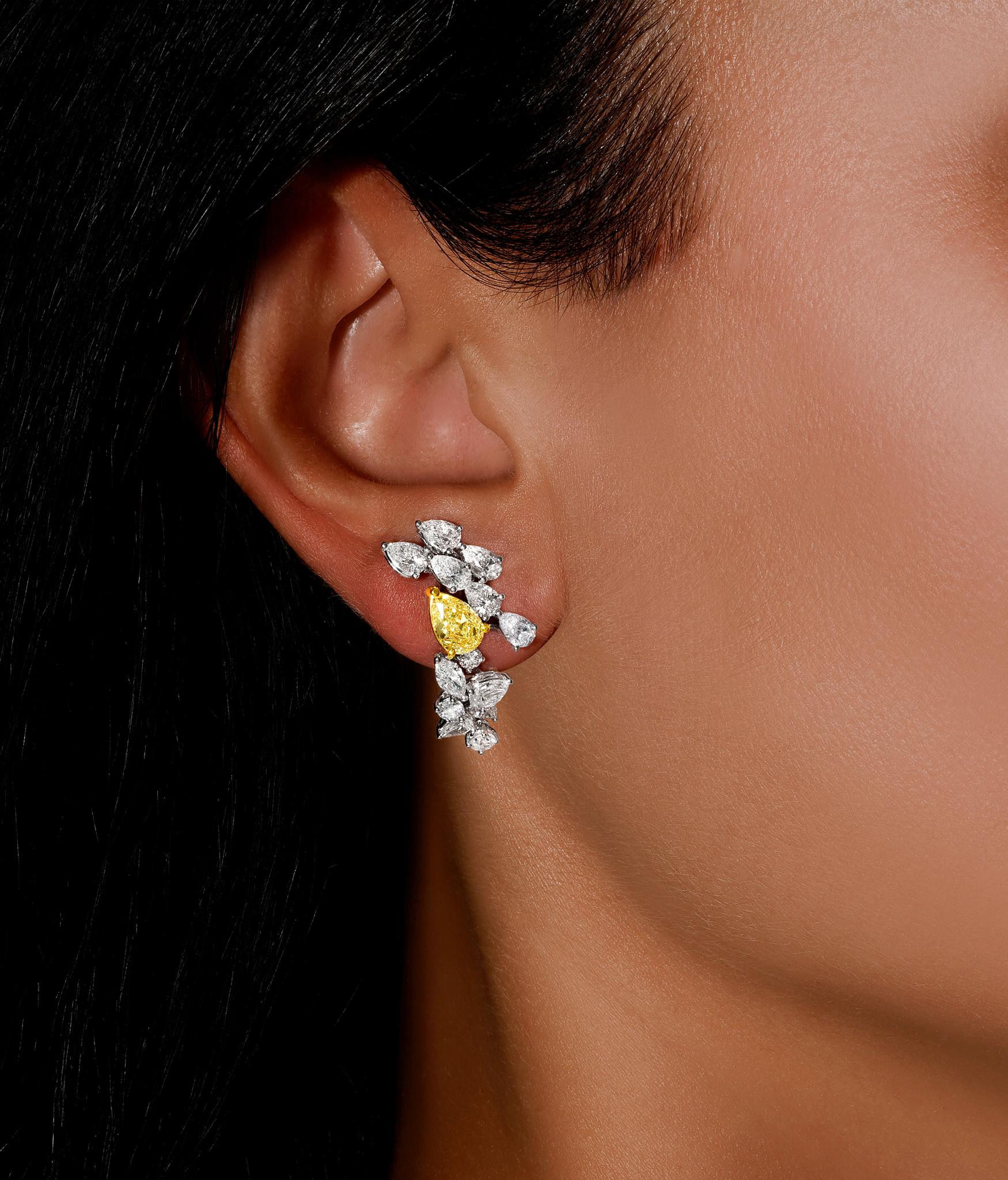 Contemporary Stunning Fancy Yellow Pear Cut Diamond Earrings 5.42 Carats Total 18K Gold For Sale