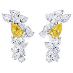 Stunning Fancy Yellow Pear Cut Diamond Earrings 5.42 Carats Total 18K Gold