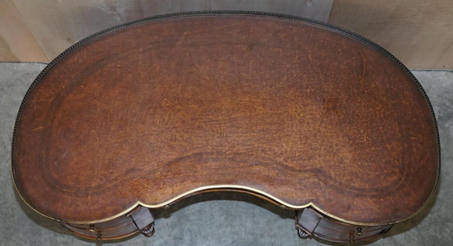 20th Century Stunning Faux Book Hardwood & Brown Leather Kidney Desk with Gallery Rail For Sale