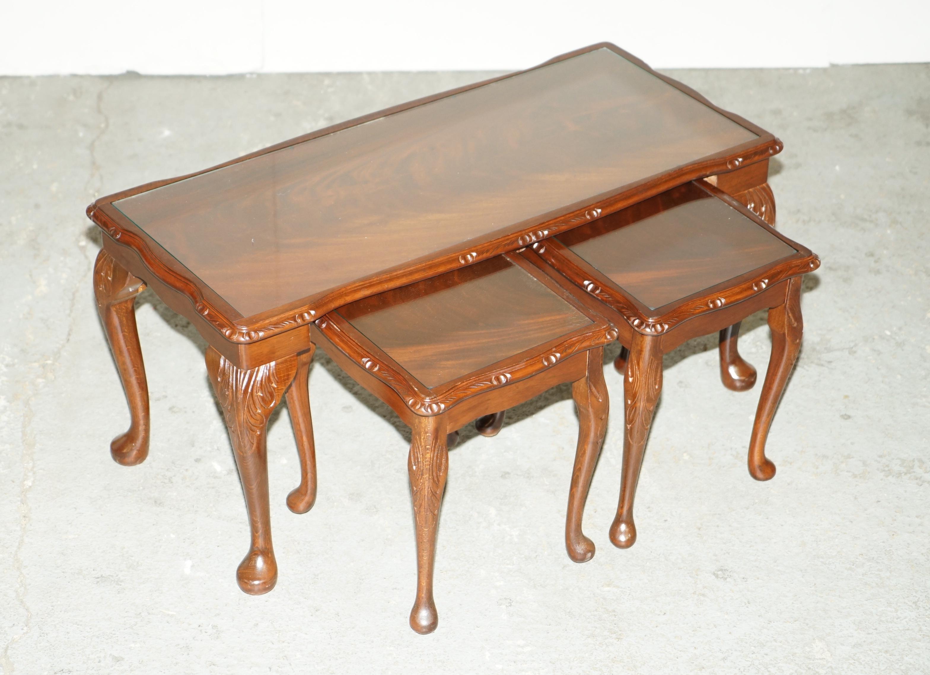All Vintage Antiques is delighted to offer for sale this lovely vintage circa 1960's nest of three Flamed Mahogany tables including one coffee table and two side tables each protected with glass tops 

Please note the delivery fee listed is just a