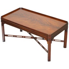 Used Stunning Flamed Hardwood Coffee or Cocktail Table Fret Work Carved Stretchers