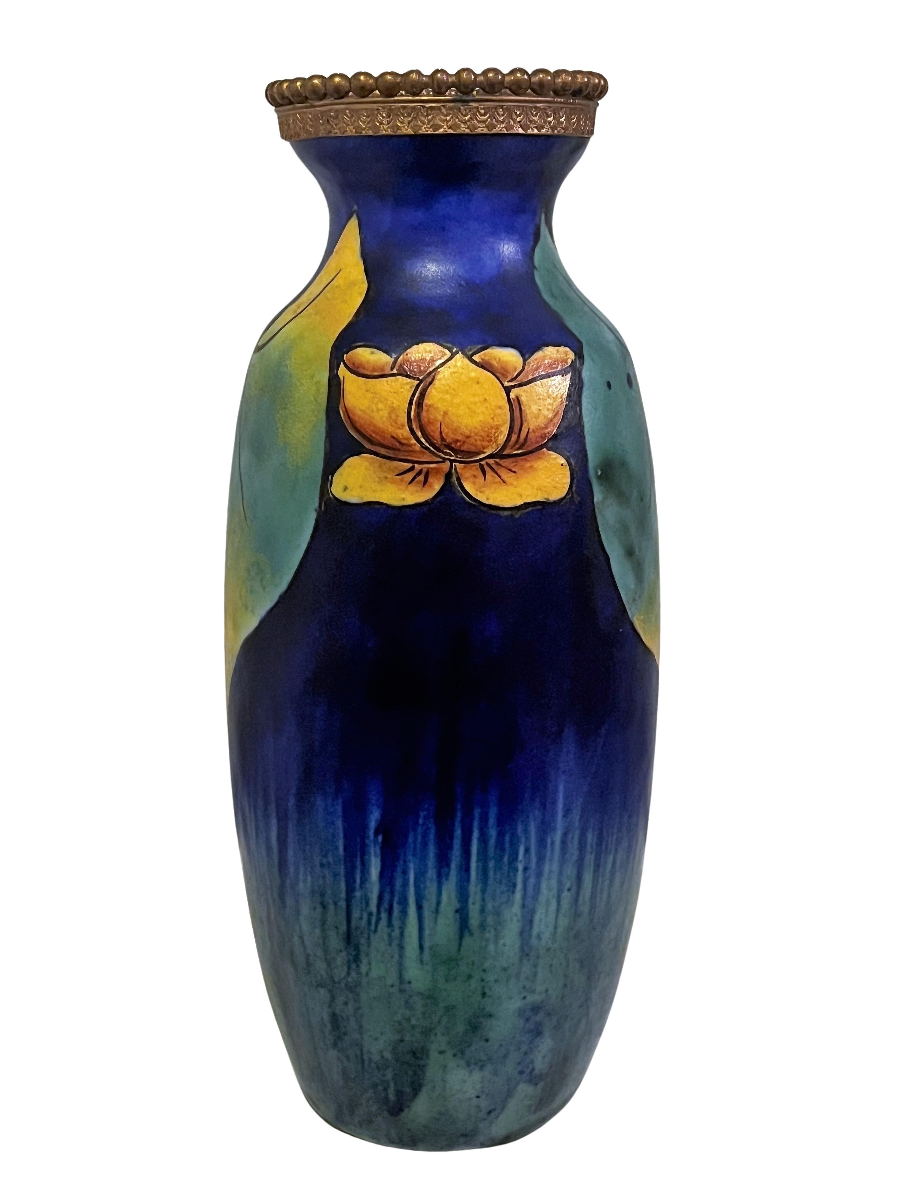 Stunning Art Deco vase, made and signed by the famous artist Louis Dage, made around 1930 in Paris, France. 

This outstanding vase has a special décor - it is made of ceramic and has a dotted, chased metal ring. The glaze is masterfully executed -