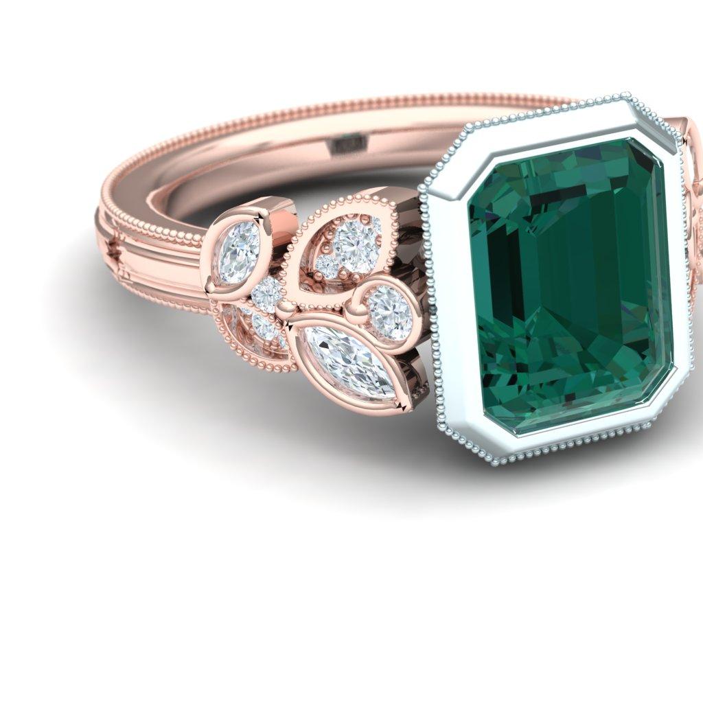 A simple and stunning ring with a rose and white gold combo holds both white brilliant diamonds and a deep pure blue green tourmaline.  The center stone on this ring is held in 18k white gold and is bezel set.  The center stone is 2.2 carats.  The