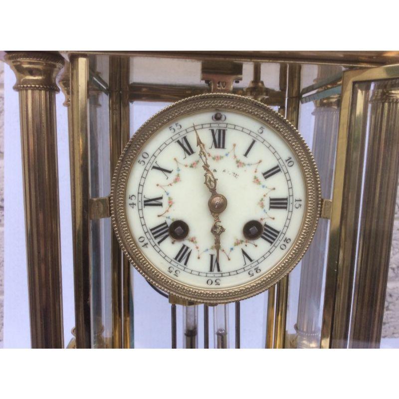 Stunning four glass onyx and brass mantel clock, mercury pendulum. 

Circa 1890. 
11.5 ins wide x 6.2ins deep x 21ins high 
The French movement is by Samuel Marti and has the makers mark on the movement backplate. It is of the makers usual high