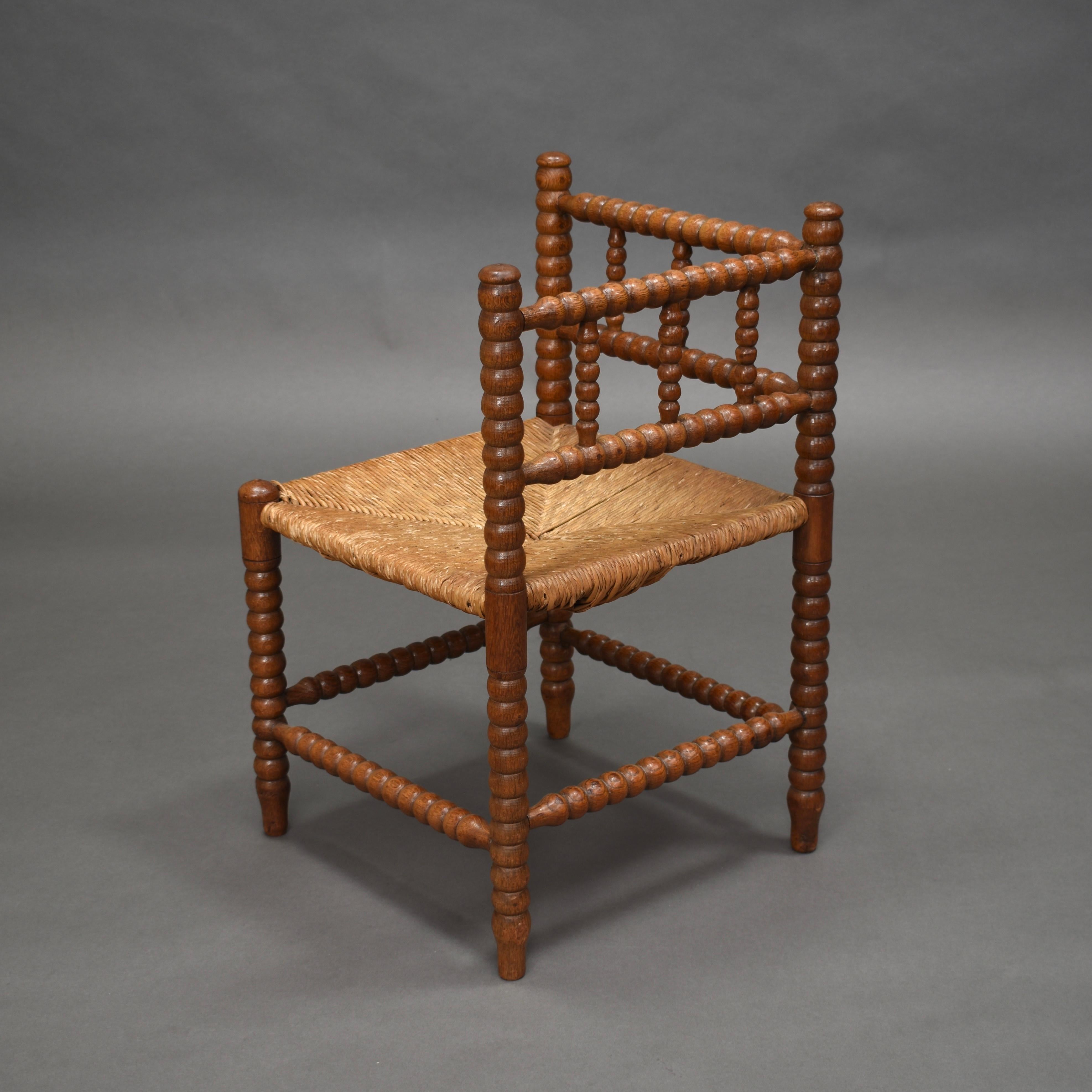 Mid-Century Modern Stunning French Corner Chair in Turned Oak and Cane, France, 1930-1940 For Sale