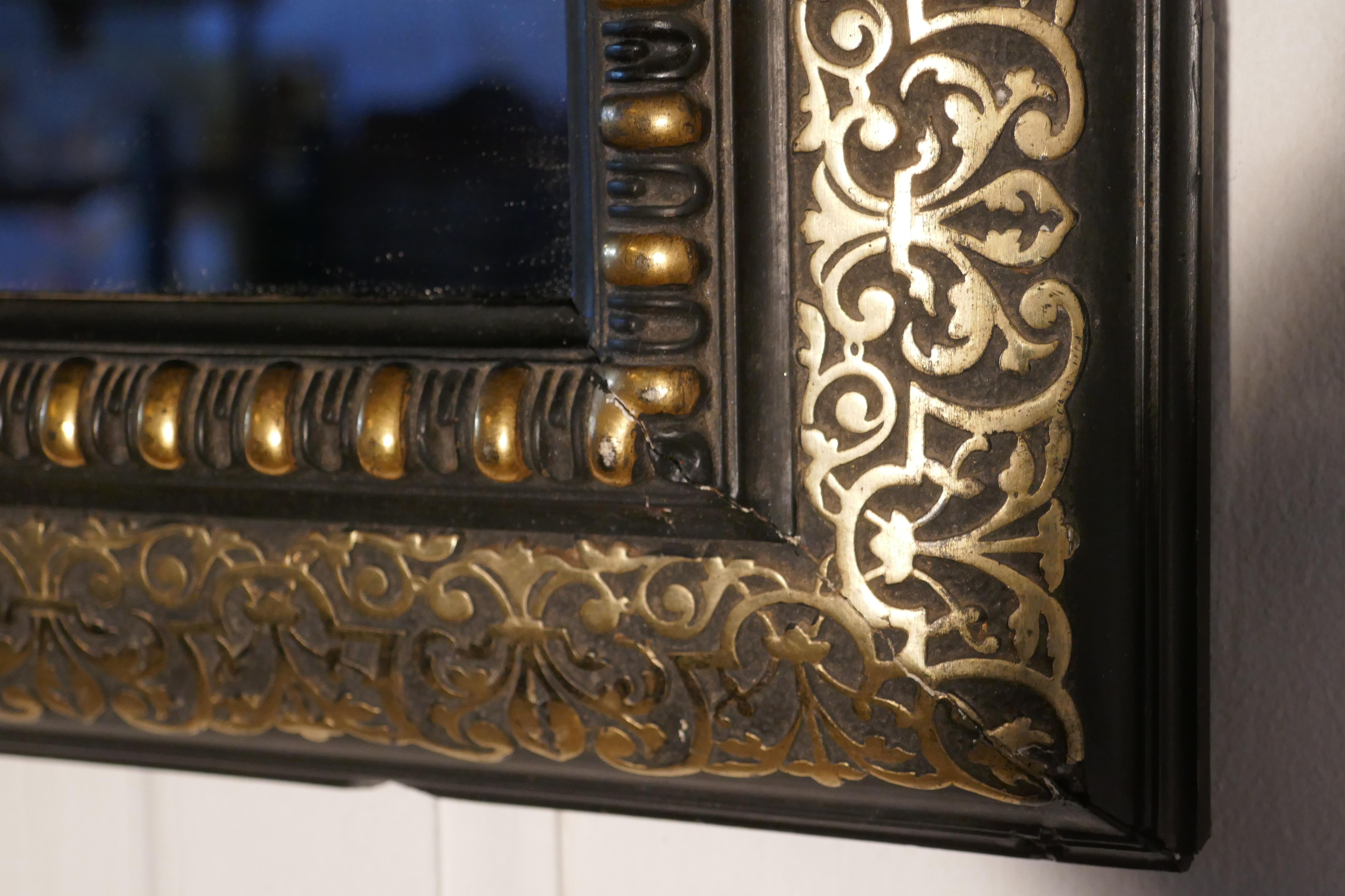 French Provincial Stunning French Empire Gilt Brass and Black Lacquer Wall Mirror For Sale