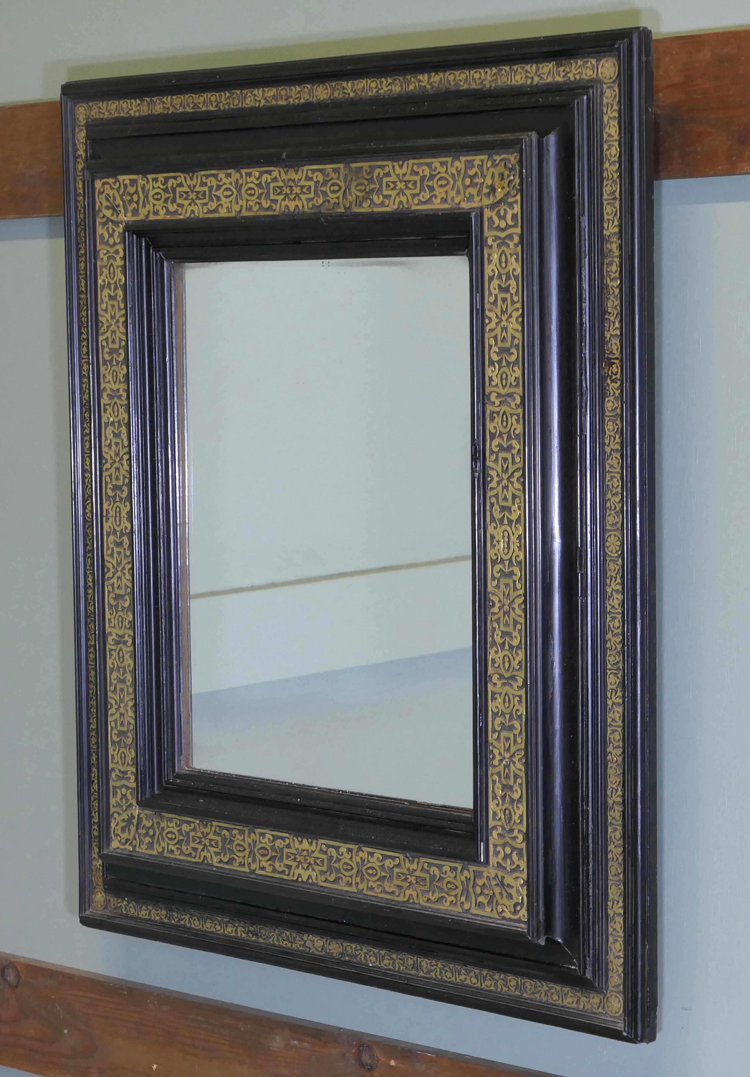 Impresionante Espejo de Pared Imperio Francés de Latón Dorado y Laca Negra siglo XIX en venta