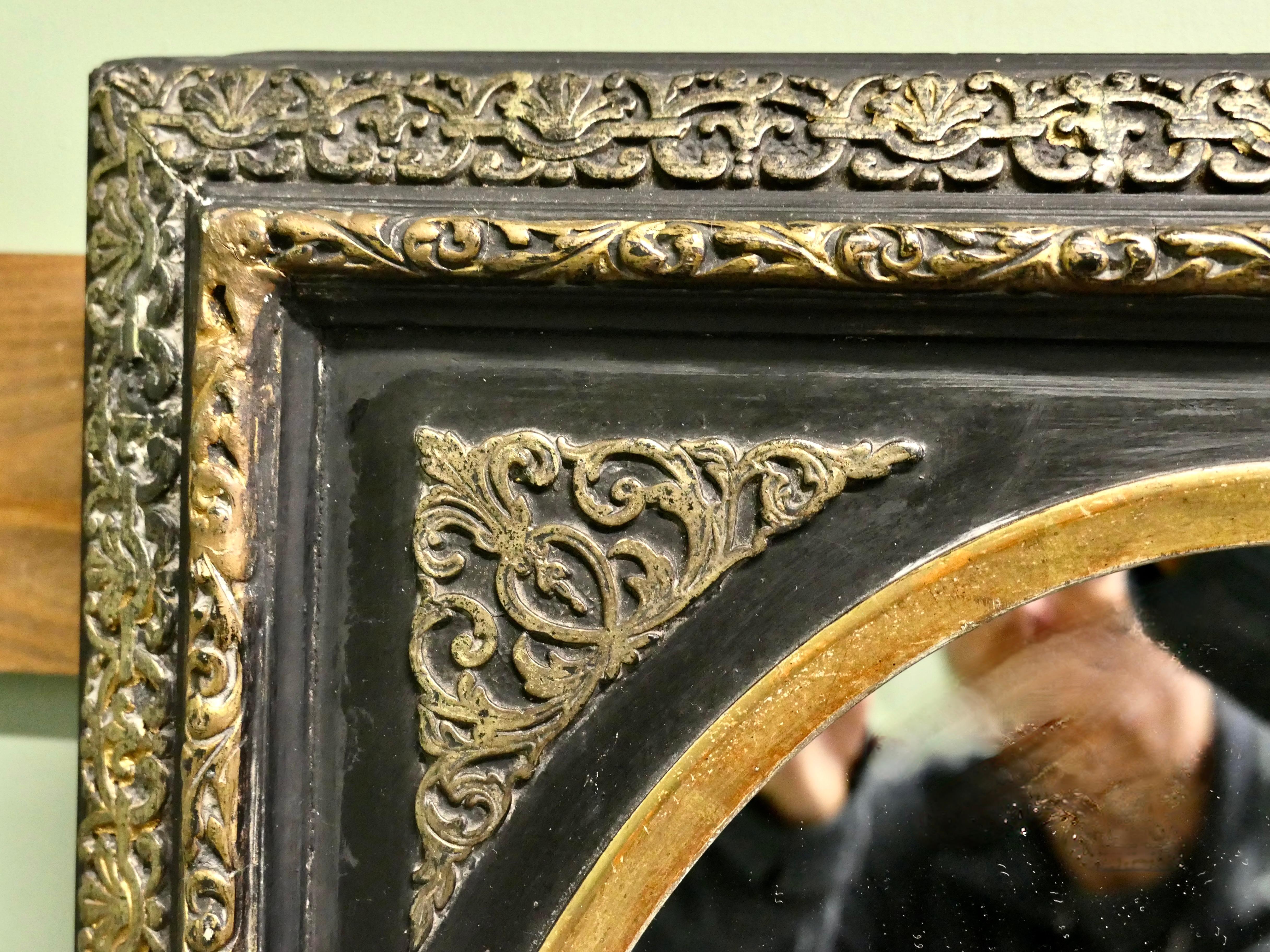 XIX secolo Splendido specchio da parete francese Impero in ottone dorato e lacca nera in vendita