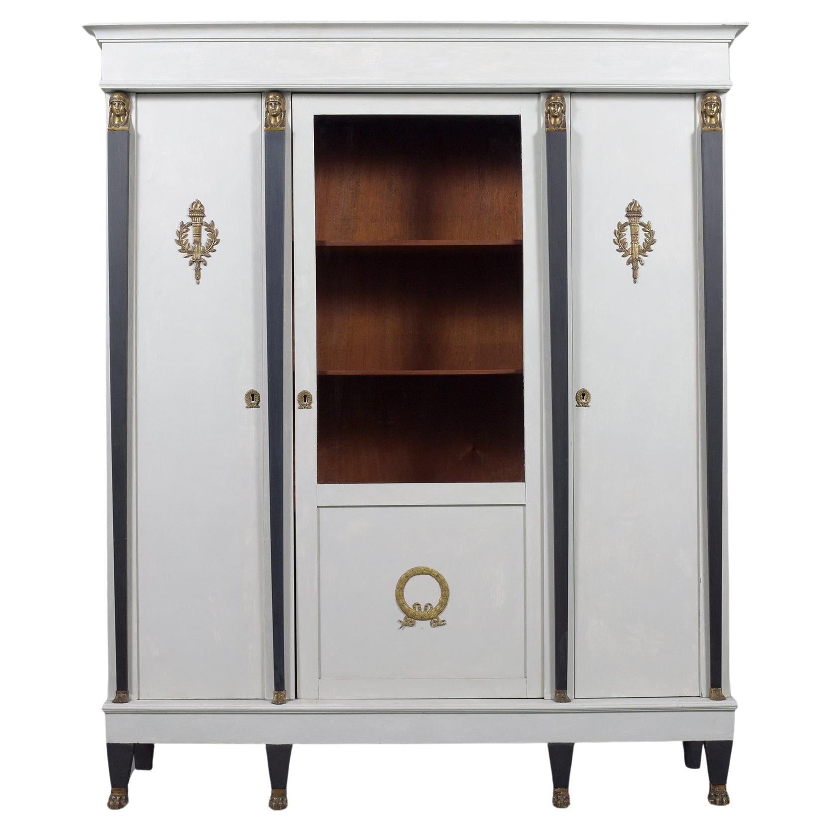 French Empire Bookcase: A Symphony of Mahogany, Brass, and Glass Elegance