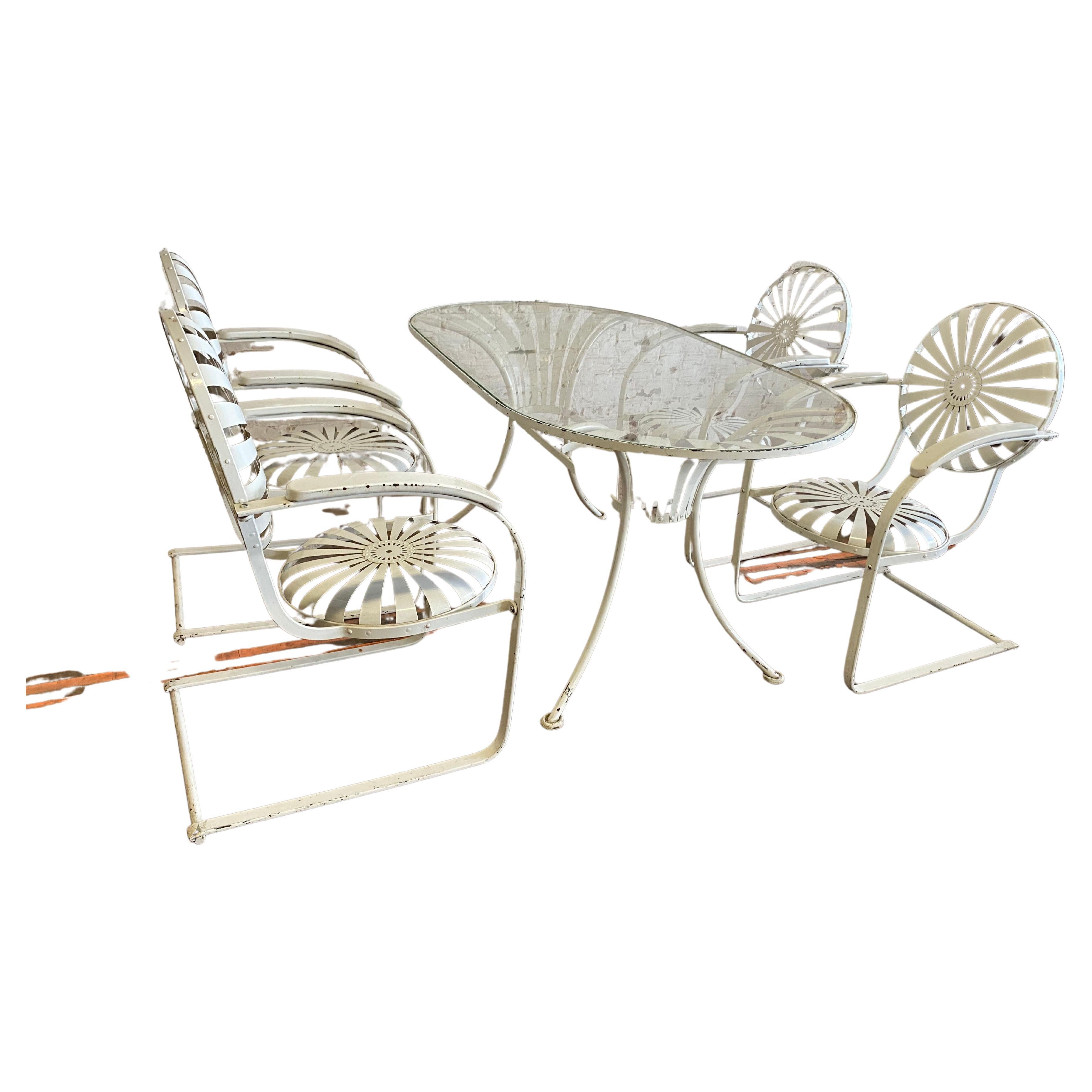 Superbe ensemble de jardin français en fer par Francois Carre, 4 fauteuils à ressort en acier  en vente