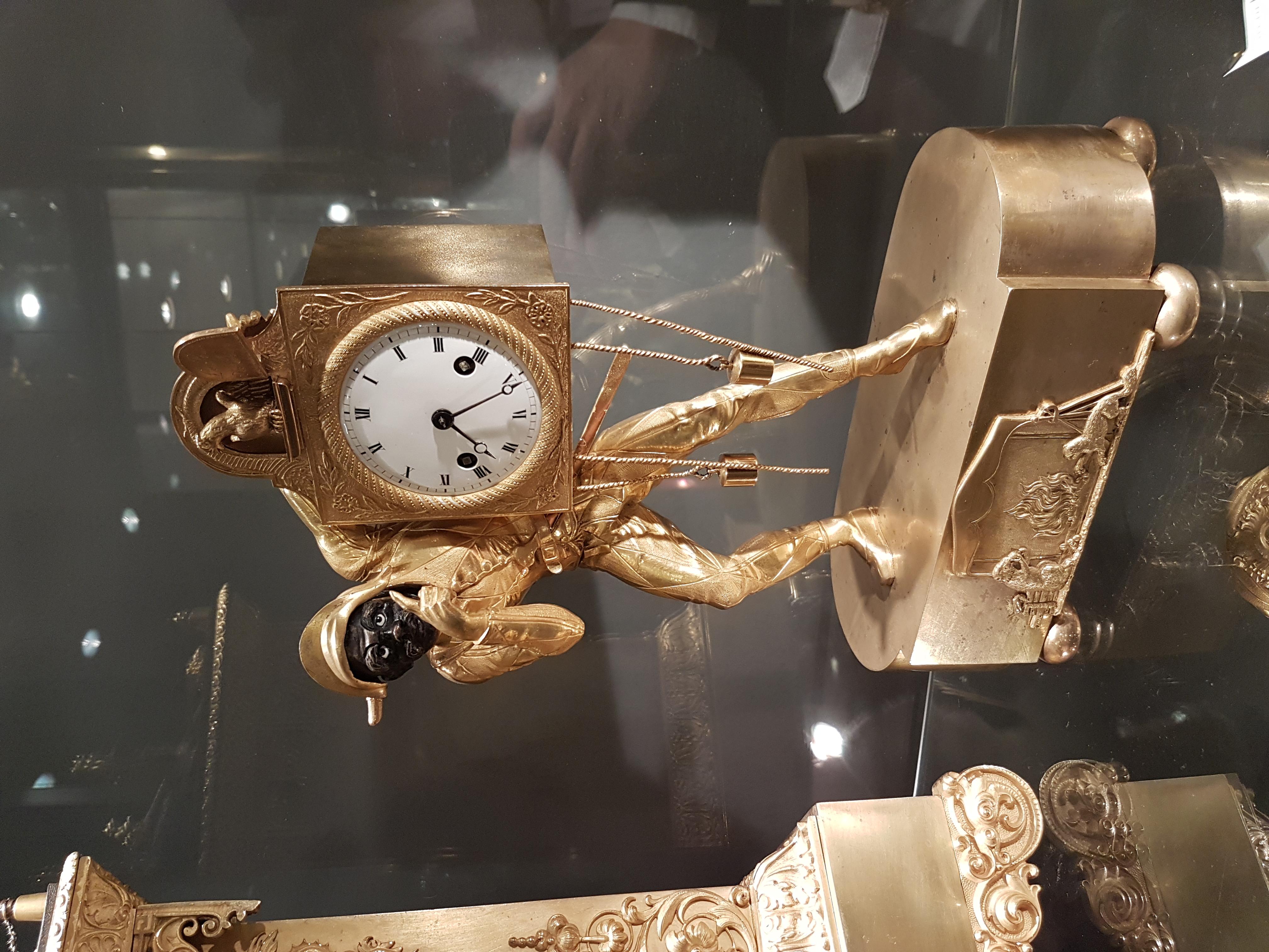 Patinated Stunning French Restauration Ormolu Harlequin Mantel Clock