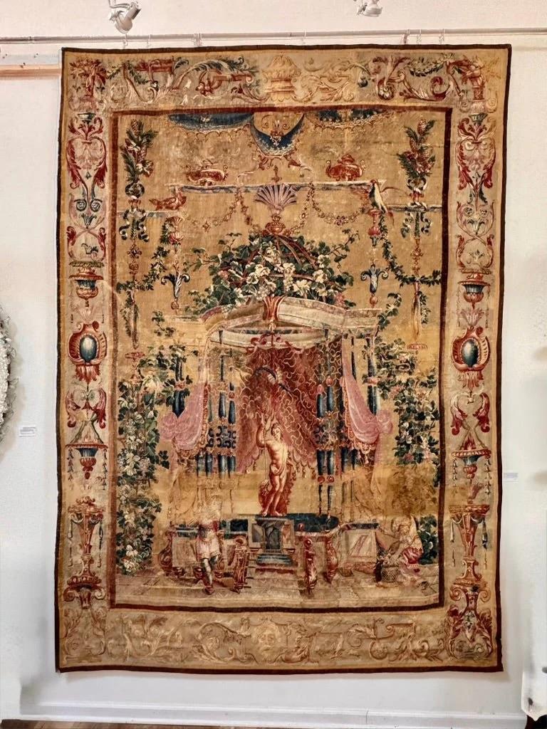 Stunning French Tapestry, c. 1700. Les Grotesques: L'Offrande a Bacchus, Beauvais manufactory; circa 1688-1732, Designed before 1688 by Jean-Baptiste Monnoyer (1636-1699)under the inspiration of Jean Berain (1640-1711), Dessinateur de la Chambre et