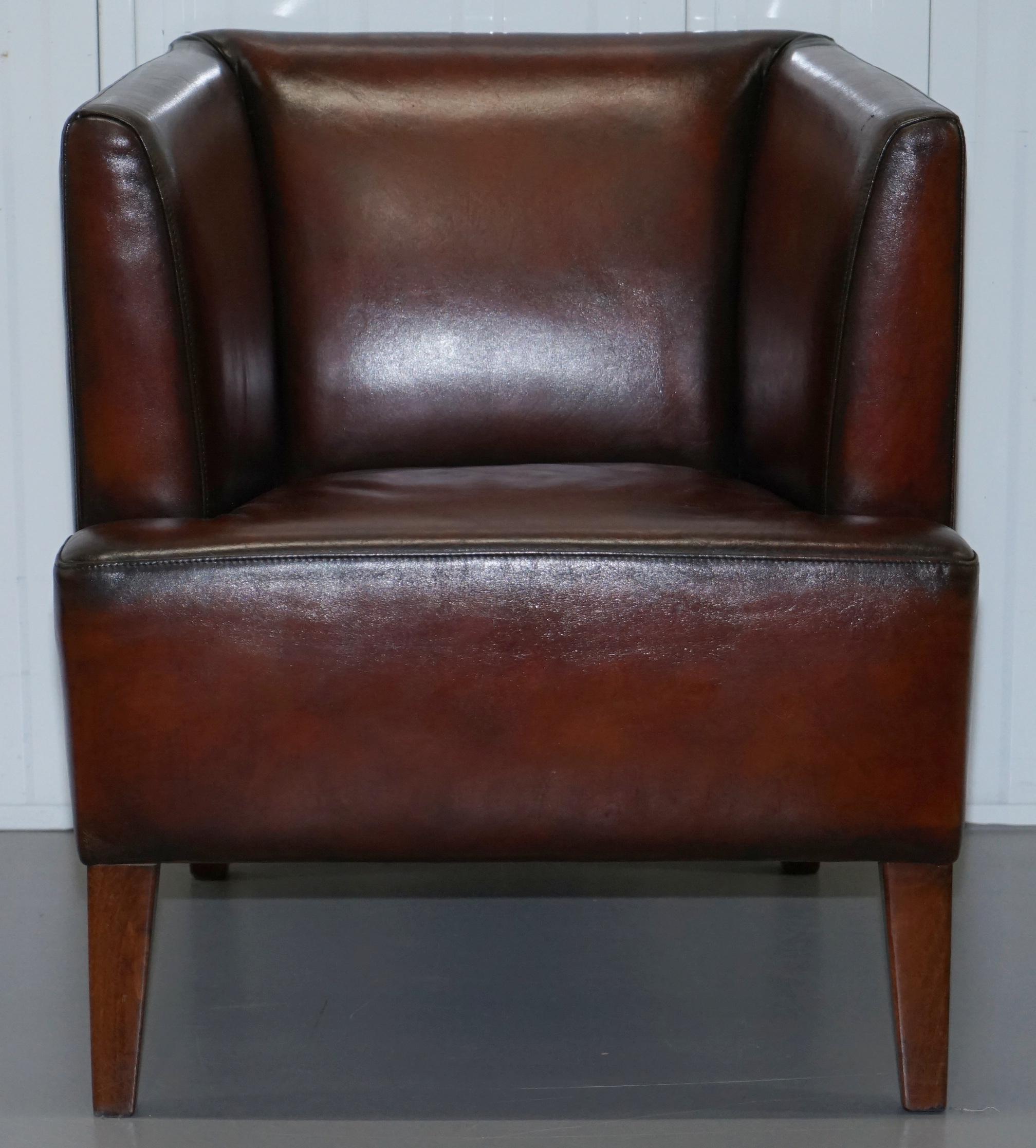 We are delighted to offer for sale this stunning fully restored dark whiskey brown leather club armchair in fully restored condition

A very good looking and nicely refurbished piece, the leather has been stripped back to the natural colour of the