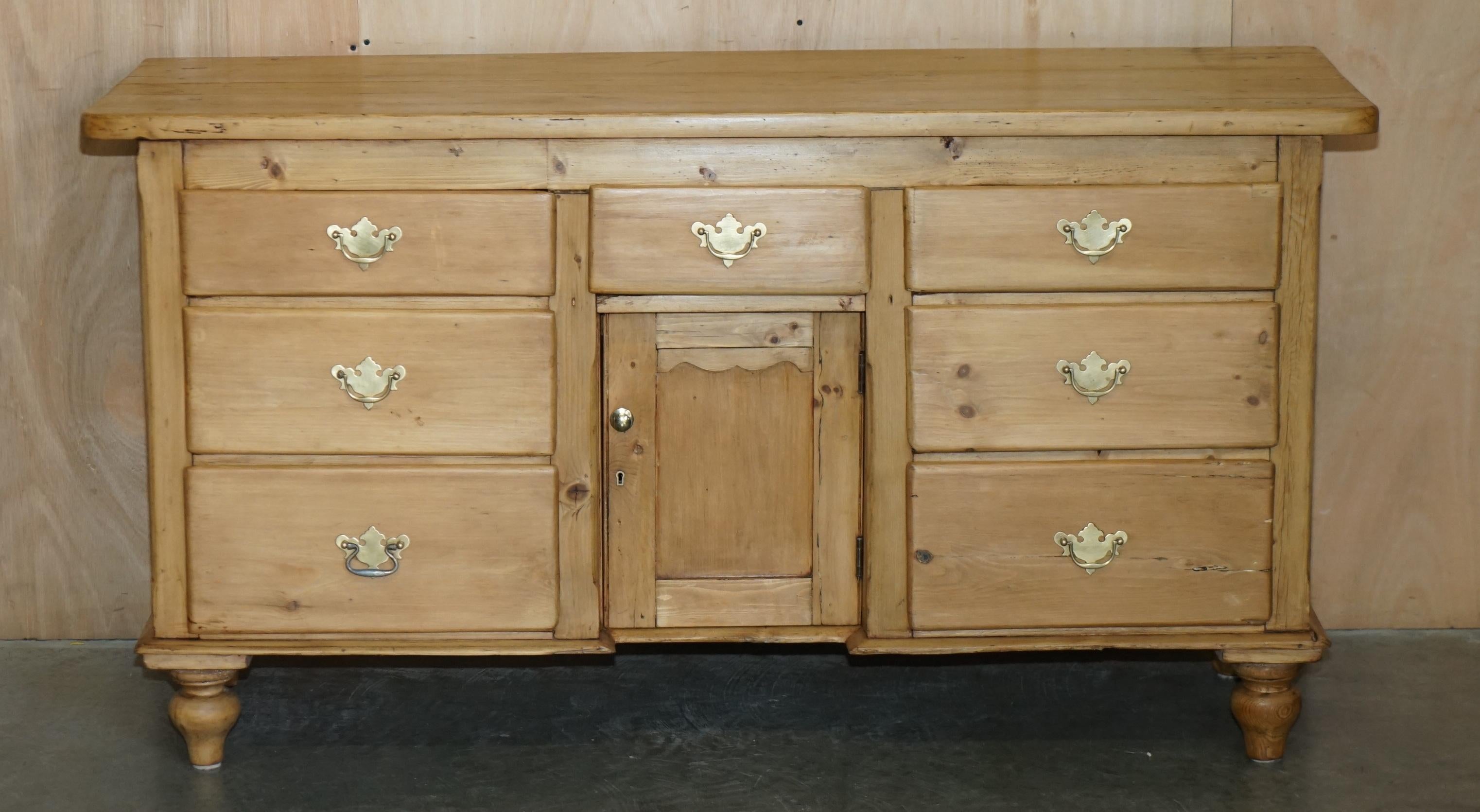 Royal House Antiques

Royal House Antiques is delighted to offer for sale this absolutely exquisite circa 1860 fully restored, stripped pine housekeepers sideboard 

Please note the delivery fee listed is just a guide, it covers within the M25 only