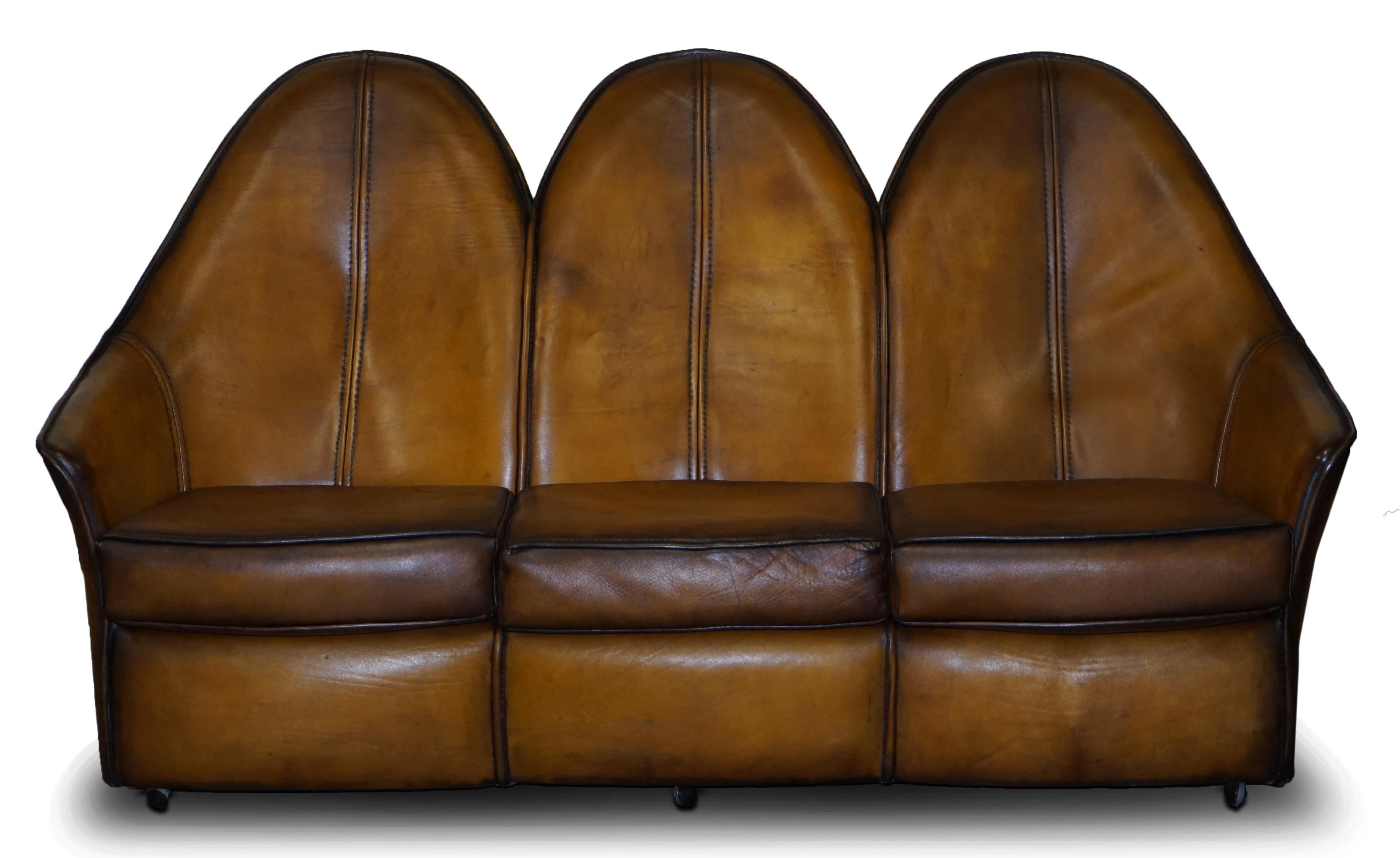 We are delighted to offer for sale this stunning fully restored Vintage hand dyed Cigar brown leather Art Modern three seater sofa which is part of a large suite

As mentioned this is part of a suite, in total I have a pair of armchairs, a two