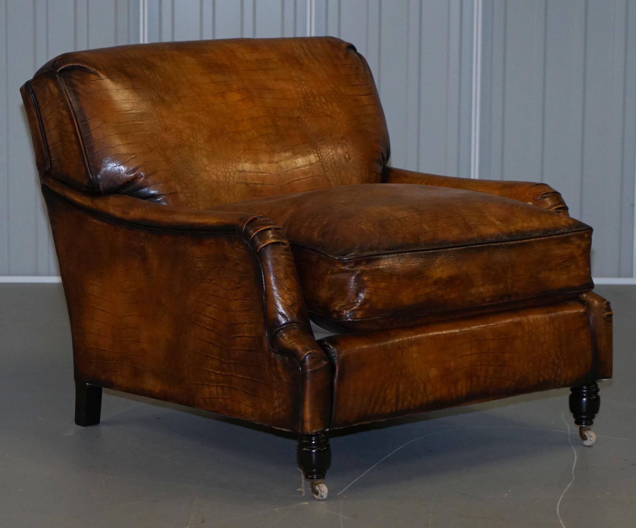 We are delighted to offer for sale this stunning exceptionally rare Howard style Crocodile Alligator leather patina club armchairs with overstuffed feather filled cushion

A very rare chair, you almost never come across this kind of leather
