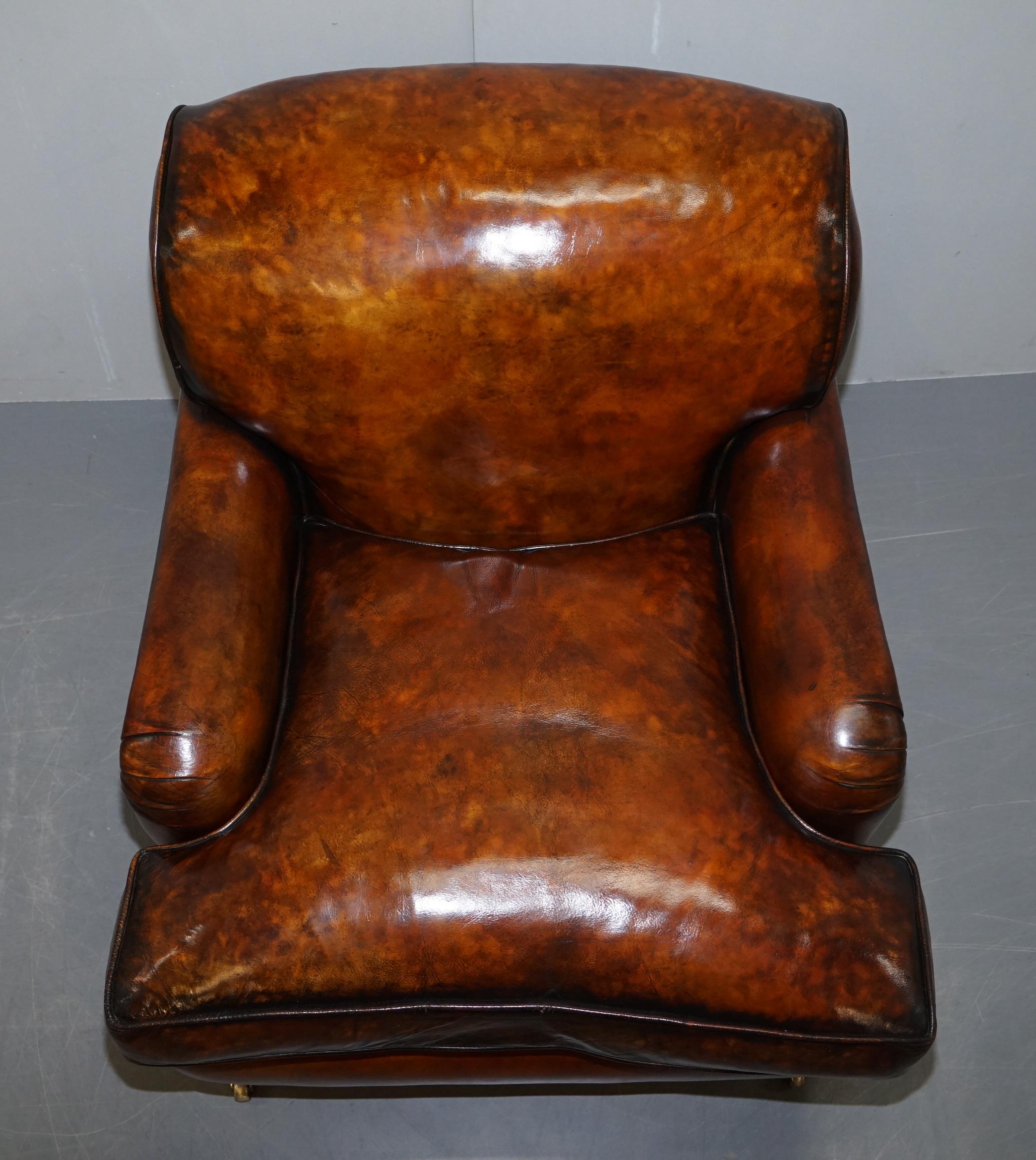 We are delighted to offer for sale this stunning exceptionally rare fully restored Howard scroll arm style leather club armchair with overstuffed feather filled cushion

A very rare chair, you almost never come across this kind of leather