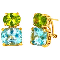 Splendidi orecchini in vermeil con peridoto ovale e topazio blu tagliato a cuscino