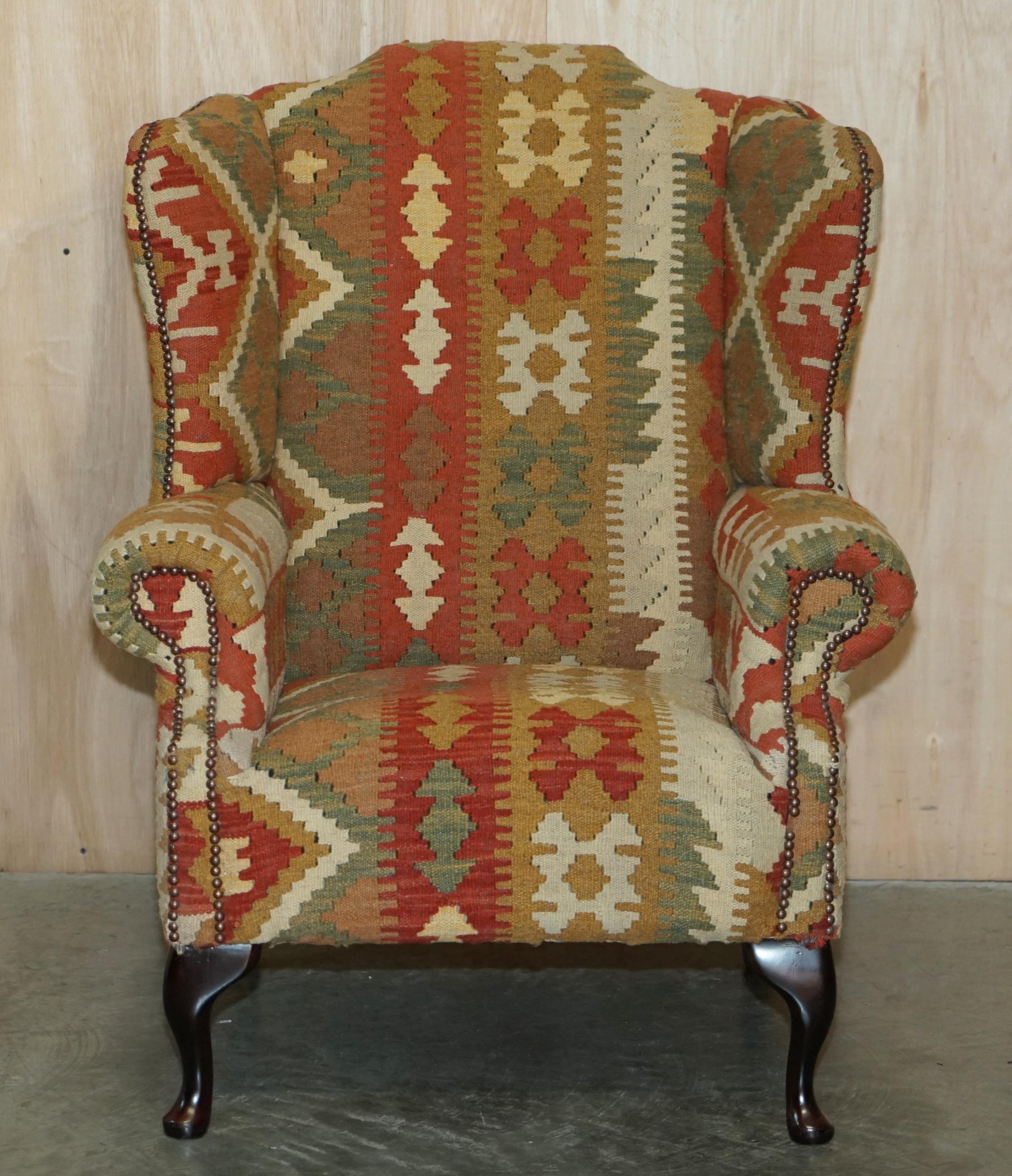 We are delighted to offer for sale this stunning George Smith style Aztec Kilim upholstered wingback armchair in perfect condition throughout.

A well-made and decorative armchair which is very comfortable, the upholstery is Kilim as mentioned