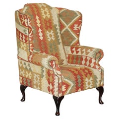 Splendida poltrona a dorso d'ala con tappezzeria Kilim azteca in stile Smith & Smith