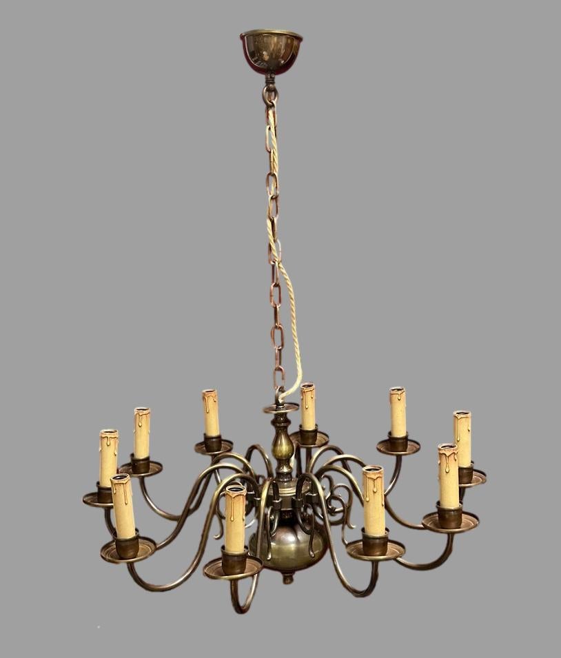 Add a touch of opulence to your home with this charming chandelier! Perfect patina to the Metal to enhance any chic or eclectic home. We'd love to see it hanging in an entry hall or in a Living / Dinning room area. Built in the 1950s, made by a