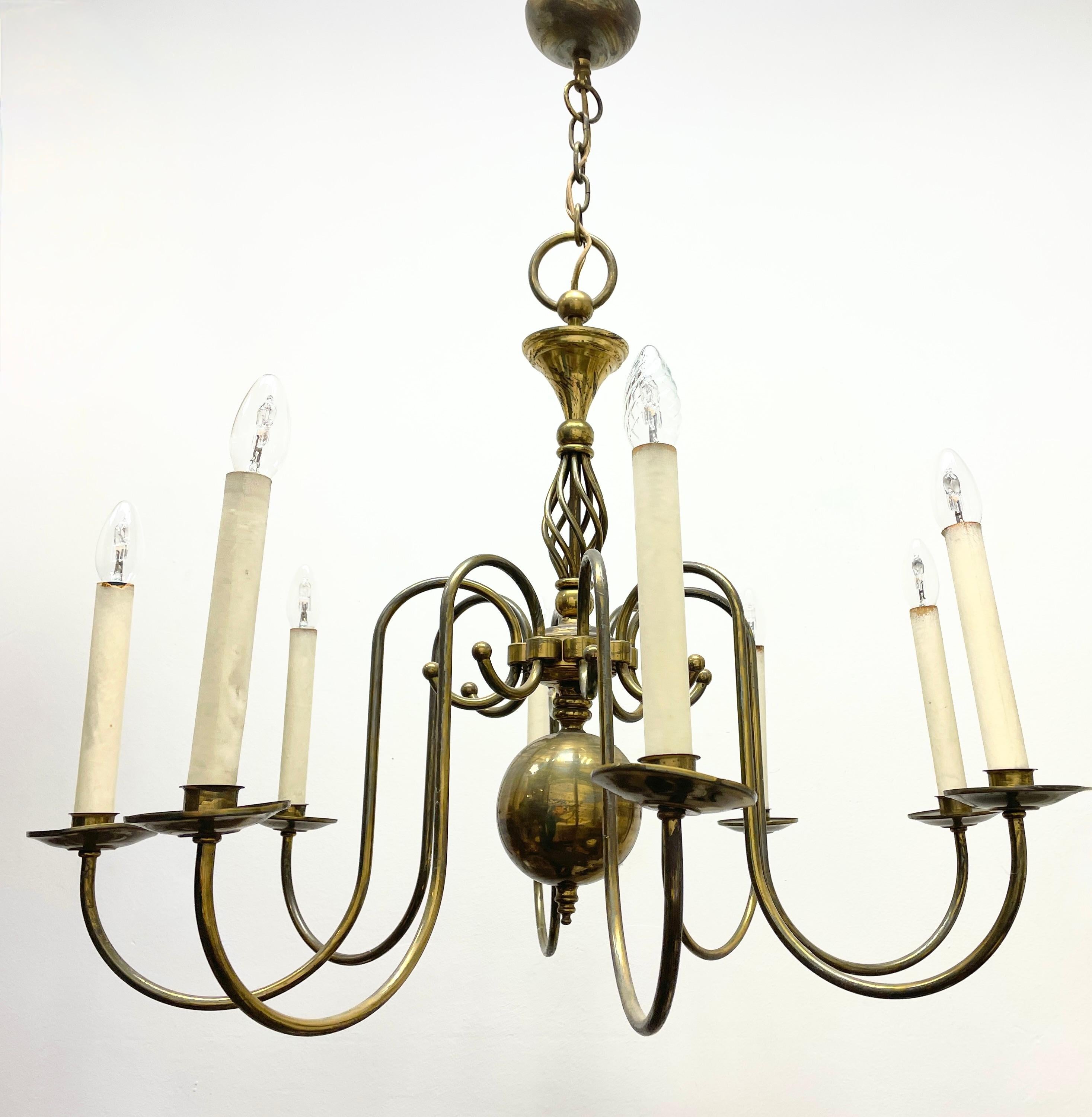 Add a touch of opulence to your home with this charming chandelier! Perfect patina to the Metal to enhance any chic or eclectic home. We'd love to see it hanging in an entry hall or in a Living / Dinning room area. Built in the 1930s, made by a