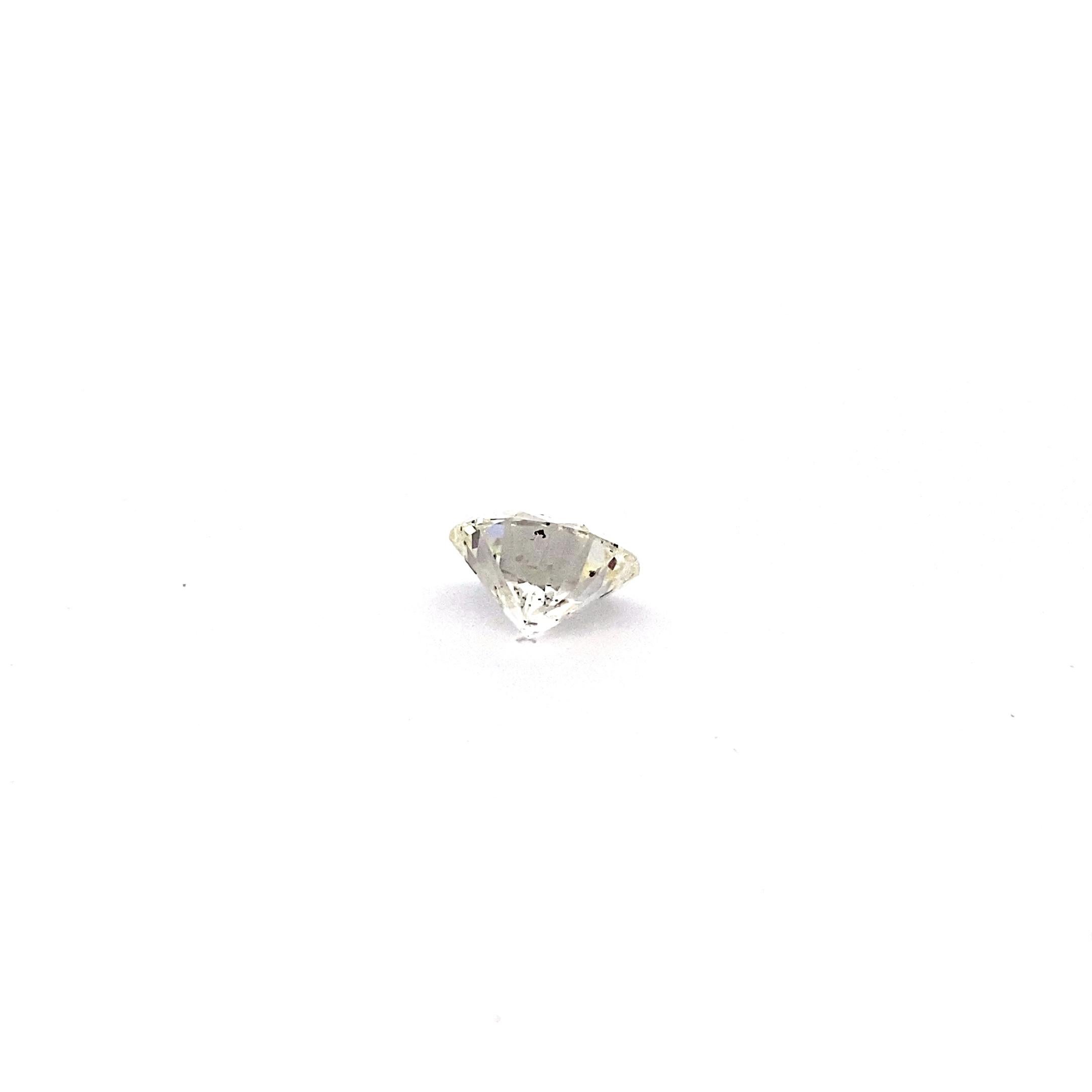Stunning GIA Certified 12.80 Carat Round Brilliant Cut Diamond J color, SI1 In Excellent Condition For Sale In Palm Desert, CA