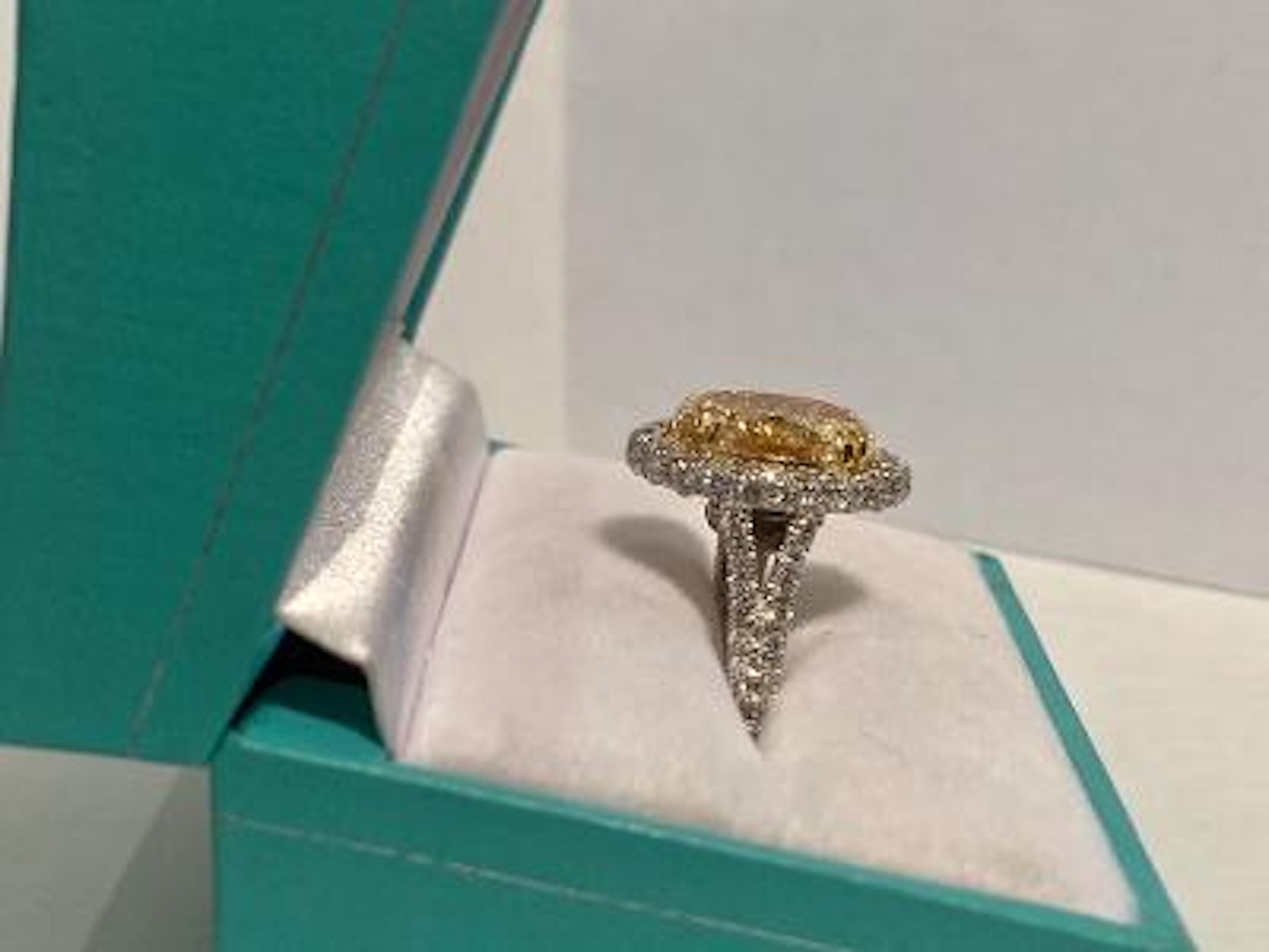Stunning GIA Certified 8.38 Carat Natural Fancy Yellow Oval Shaped Diamond Ring In Excellent Condition In Tustin, CA