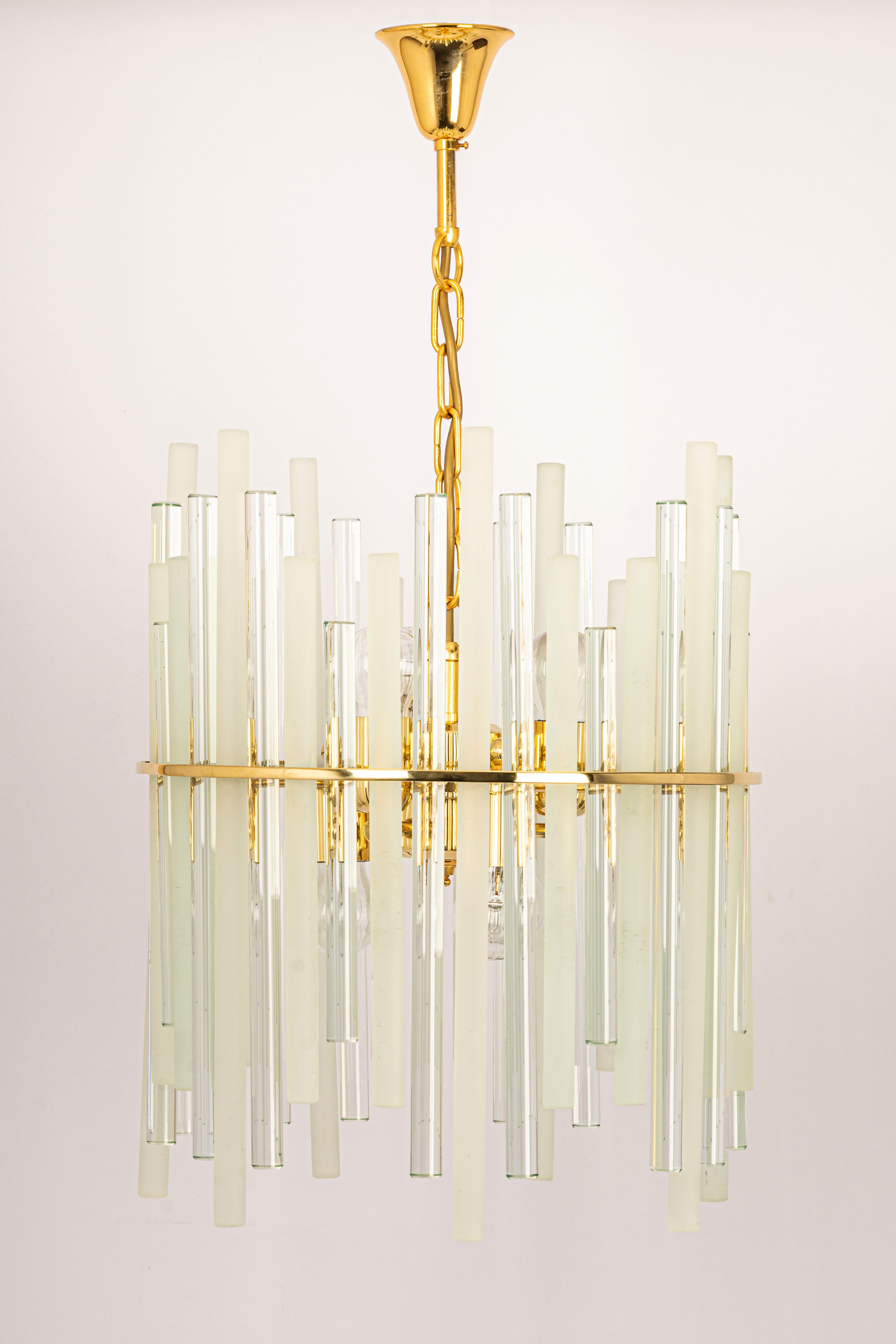 A stunning chandelier by Christoph Palme Germany, manufactured in 1970s. It’s composed of crystal glass rods on a brass frame.

Sockets: It needs 6 x E27 standard bulbs ( max. 80 Watts each)
Light bulbs are not included. It is possible to install
