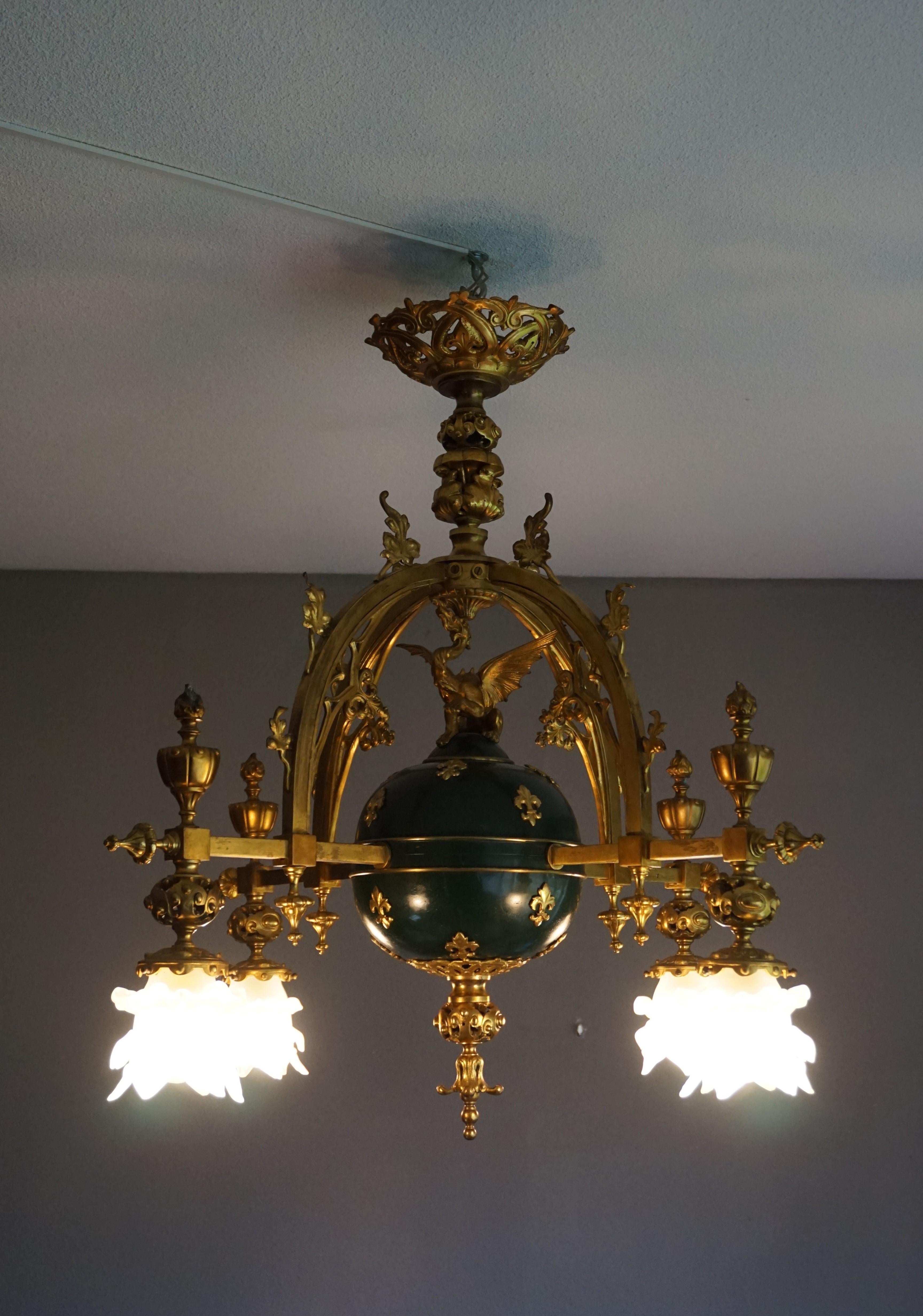 One of a kind Gothic pendant from circa 1900.

With antique light fixtures as one of our specialties we recognize a rare and good quality specimen when we see one. And this amazing Gothic revival chandelier simply ticks all the boxes. When you