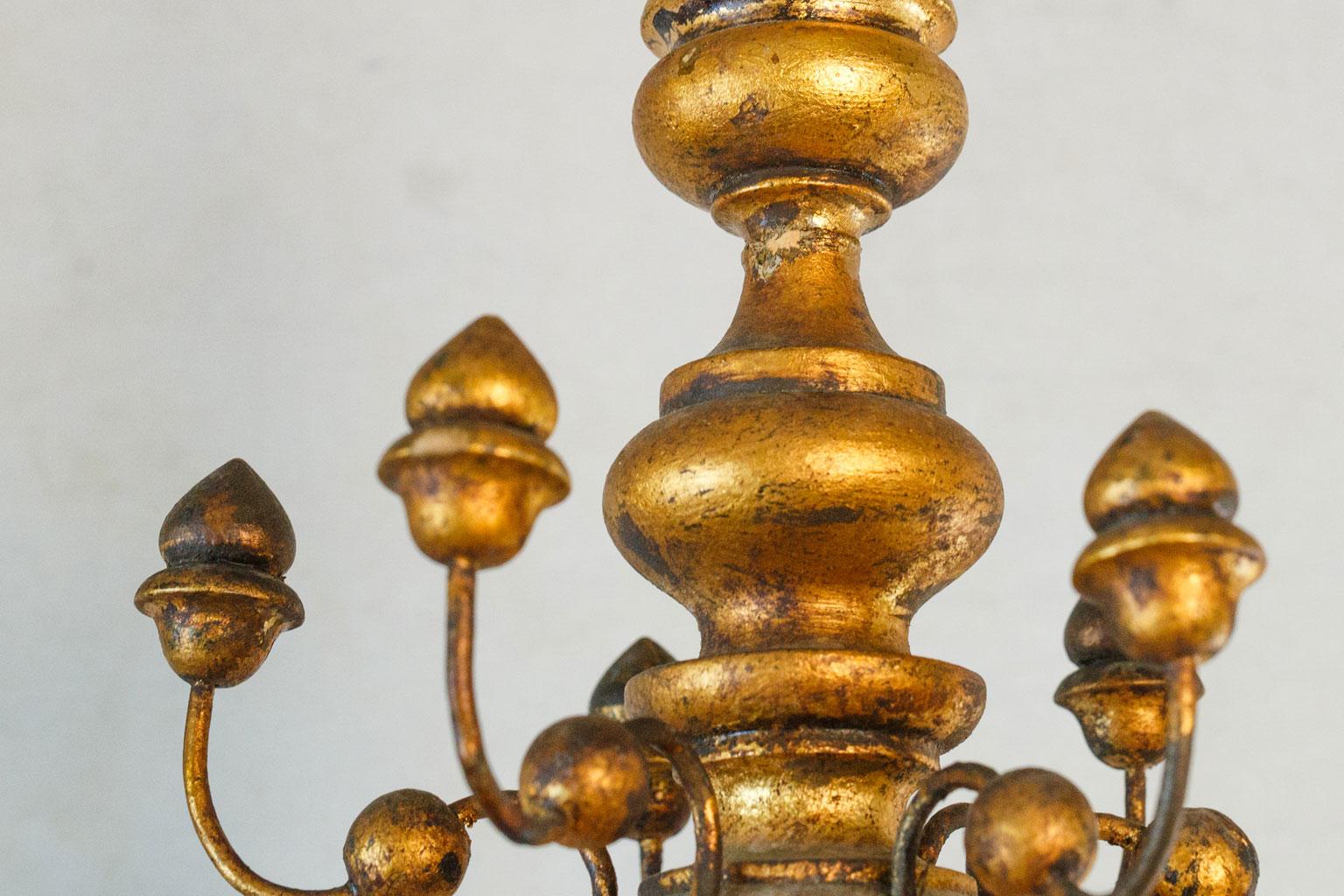 Stunning Gilt  Italian Chandelier of Metal and Wood with  playful design.  For Sale 2