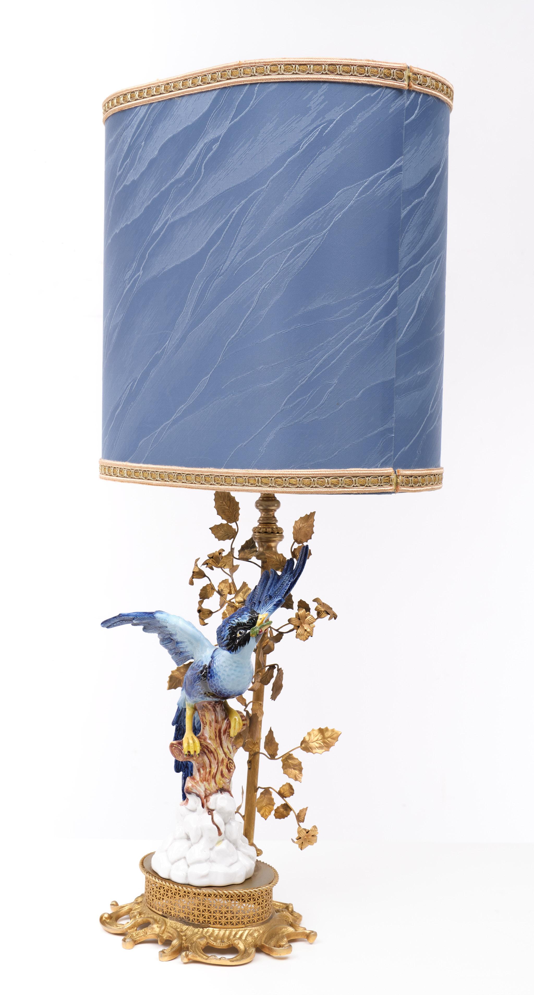 Stunning  Giulia Mangani, Italian Tole lamp with exotic Bird - Sèvres style porcelain - With movable flowers. Manufactured by Limoges . 1970s comes with its original Silk shade .
One large E27 bulb needed . 
Please don't hesitate to reach out for