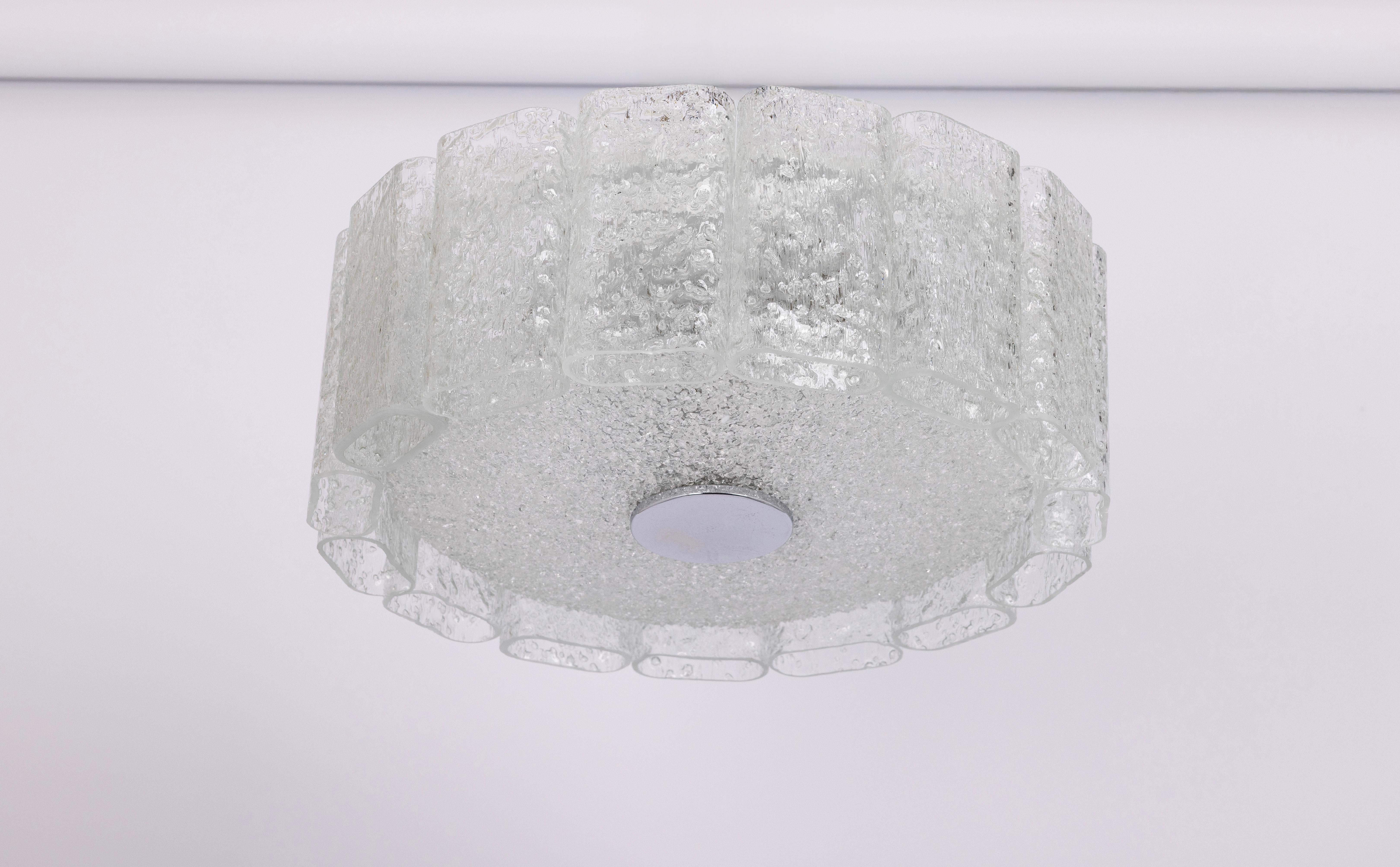 Fantastic mid-century chandelier by Doria, Germany, manufactured circa 1960-1969. Art Glass cylinders are suspended from the fixture.
High quality and in very good condition. Cleaned, well-wired, and ready to use. 

The fixture requires 2 x E27