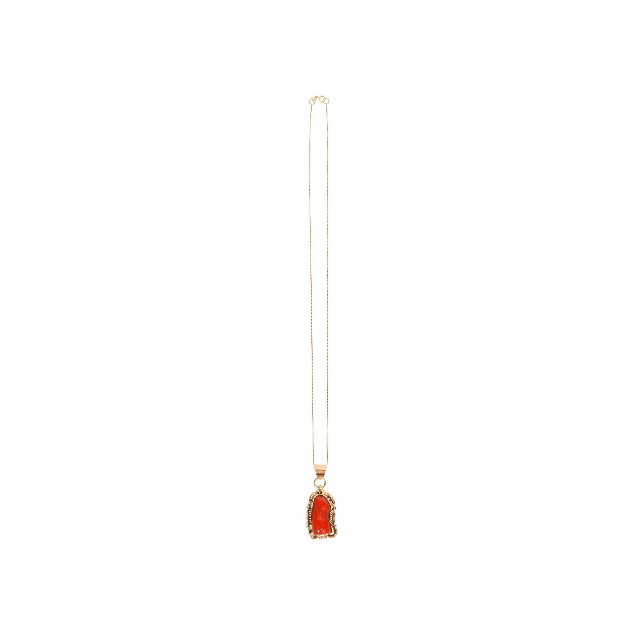 Stunning 14kt gold pendant and chain with exceptional deep coral nugget. Designed and stamped by Navajo artist Robert Kelly.
Pendant 1 3/4