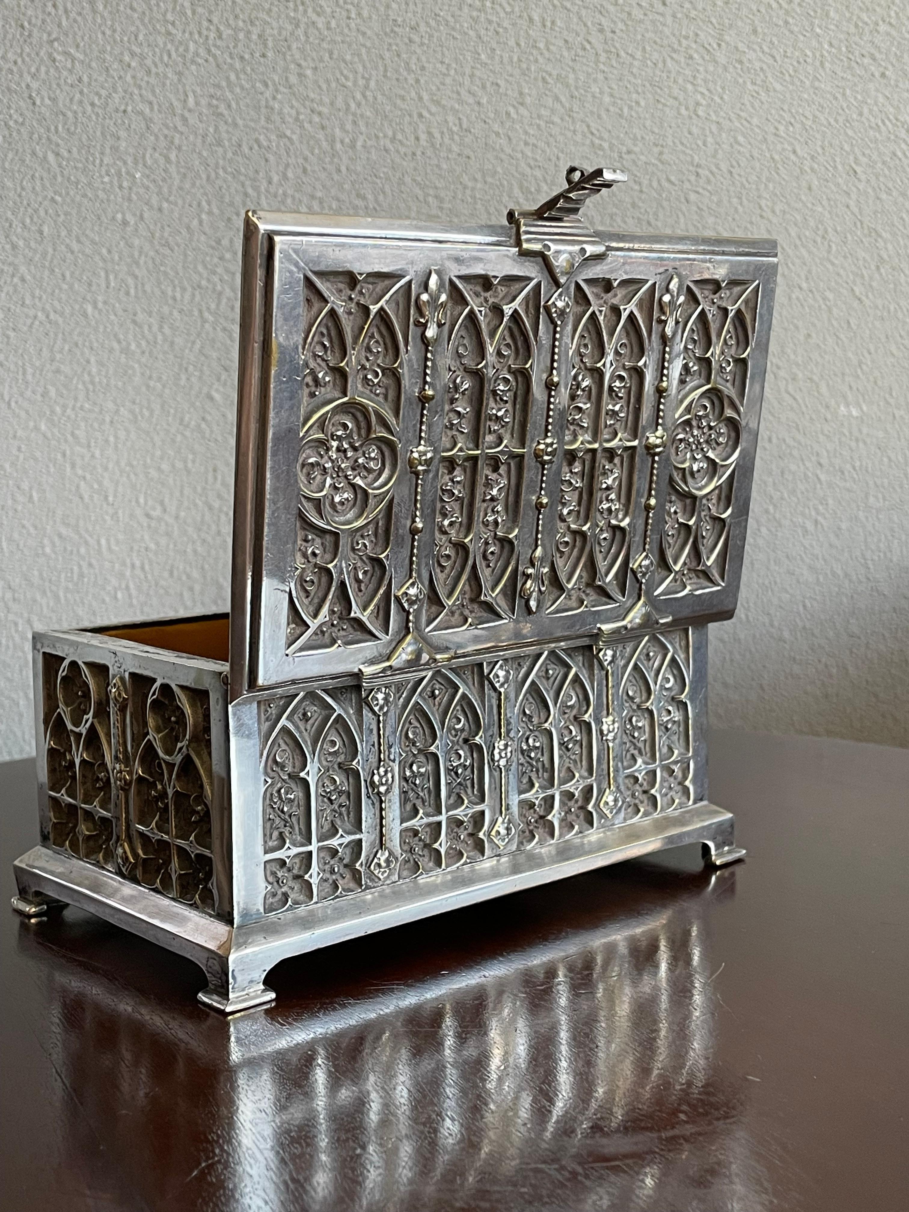 Antique, superb workmanship, silvered bronze Gothic box with quatrefoils in church window-like panels.

Over the years we have sold a number of rare and unique boxes, but never a Gothic Revival one looking like a medieval antiquity and with such