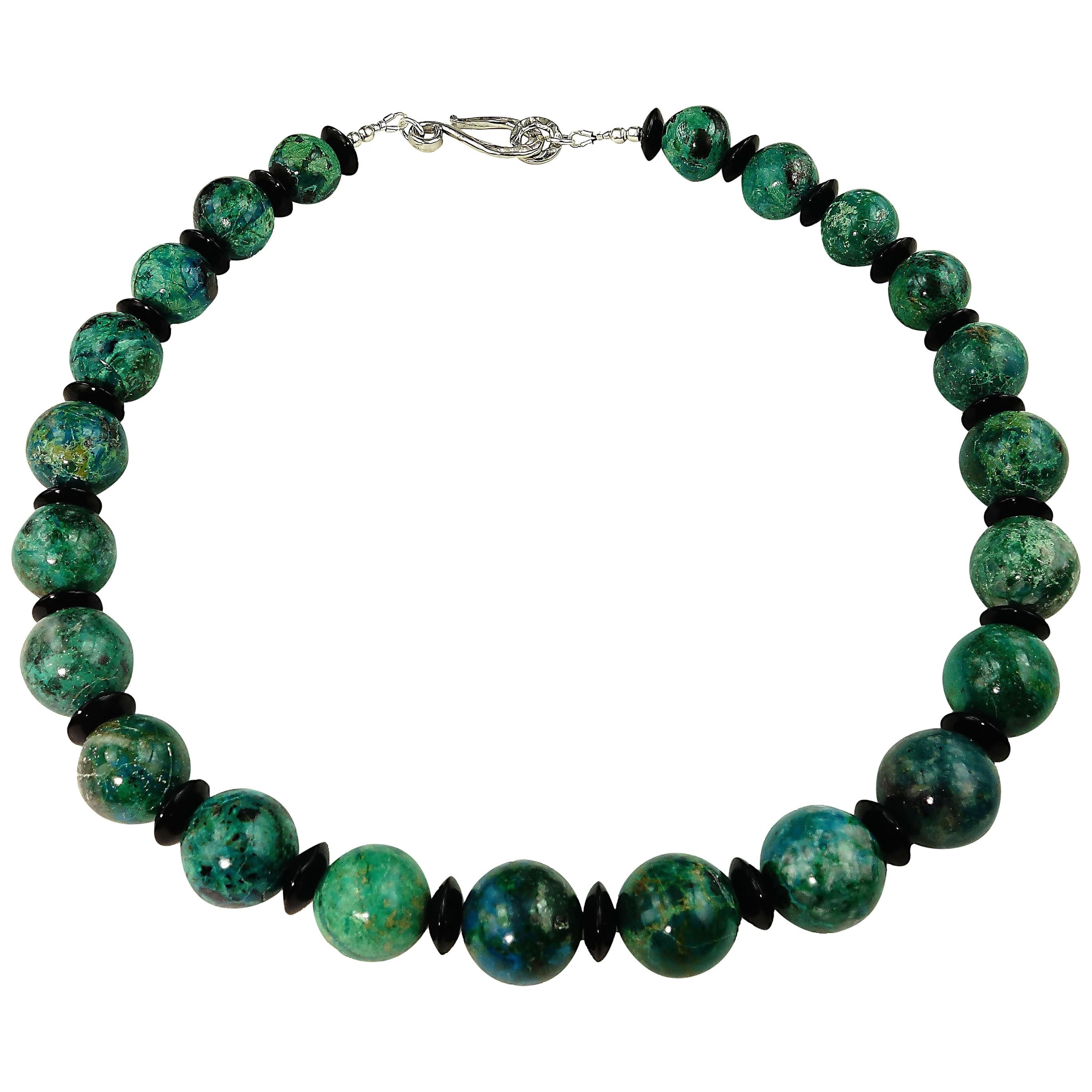 Luscious Green/blue Chrysocolla accented with highly polished rondelles of Black Onyx necklace.  This unique, handmade necklace features gently graduated, 13-15MM highly polished round Chrysocolla in varying shades of greenish blue with veins of